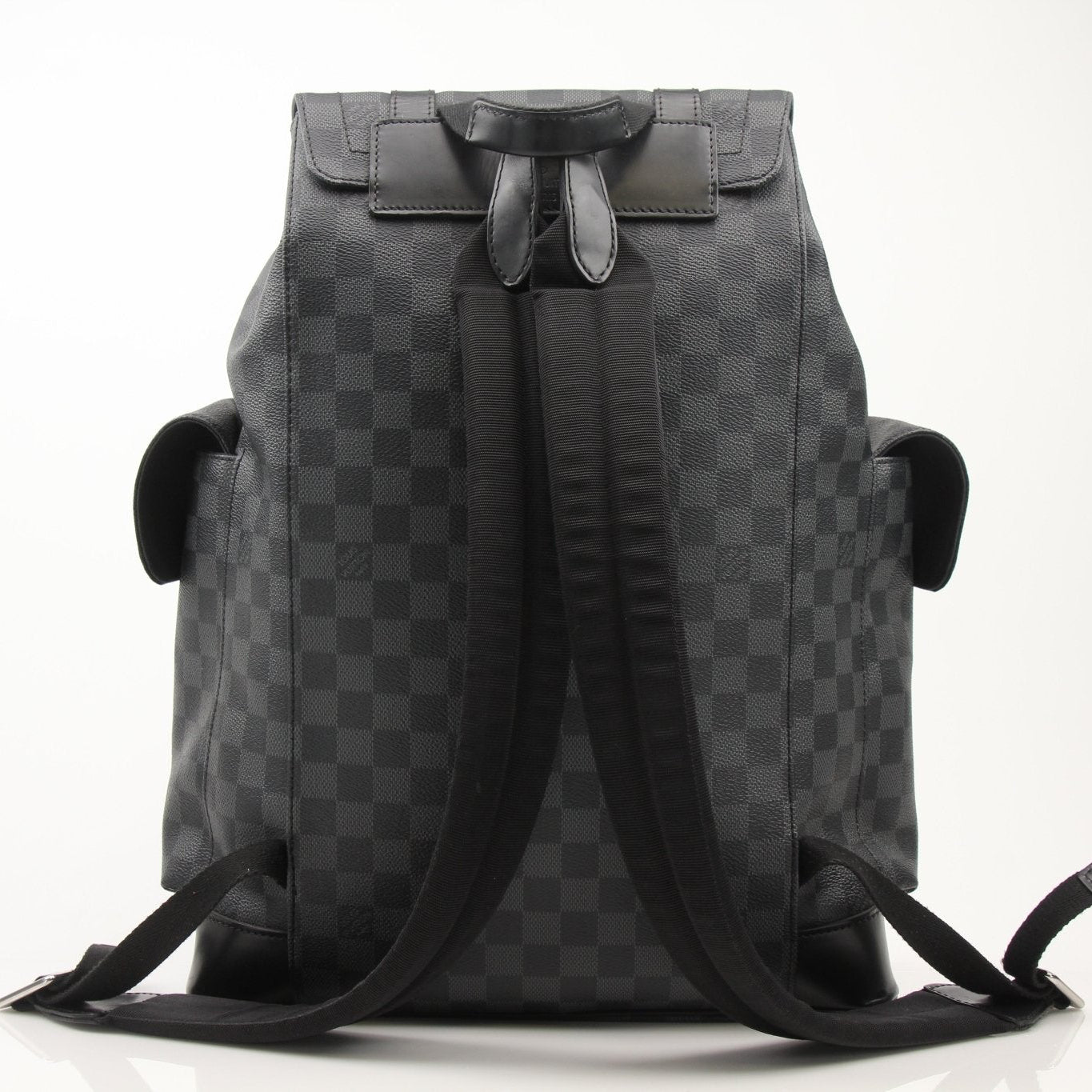 Louis Vuitton Christopher backpack for travel, featuring signature monogram canvas and leather accents, designed for stylish convenience.