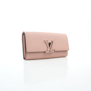 Light pink Taurillon leather Capucines wallet handbag by Gold & Beyond