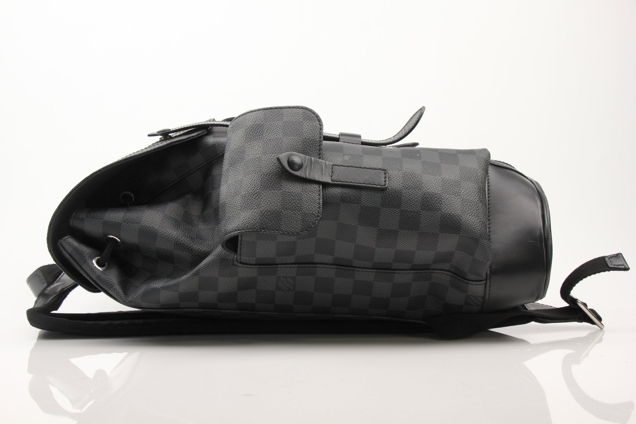 Louis Vuitton Christopher backpack, a stylish travel bag from Gold & Beyond featuring leather accents and spacious interior.