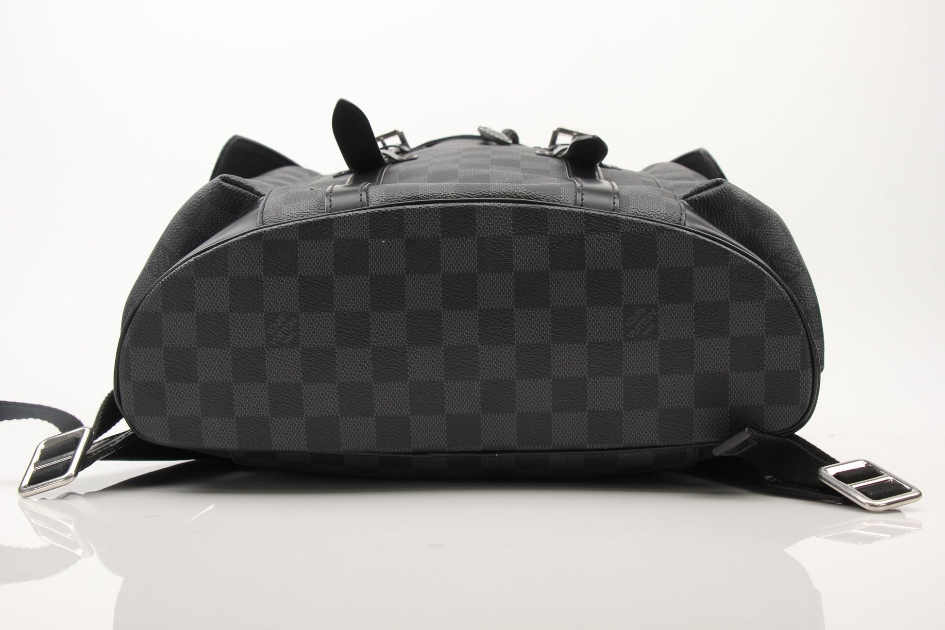 Louis Vuitton Christopher backpack, a stylish travel bag from Gold & Beyond, featuring sleek design and spacious compartments.