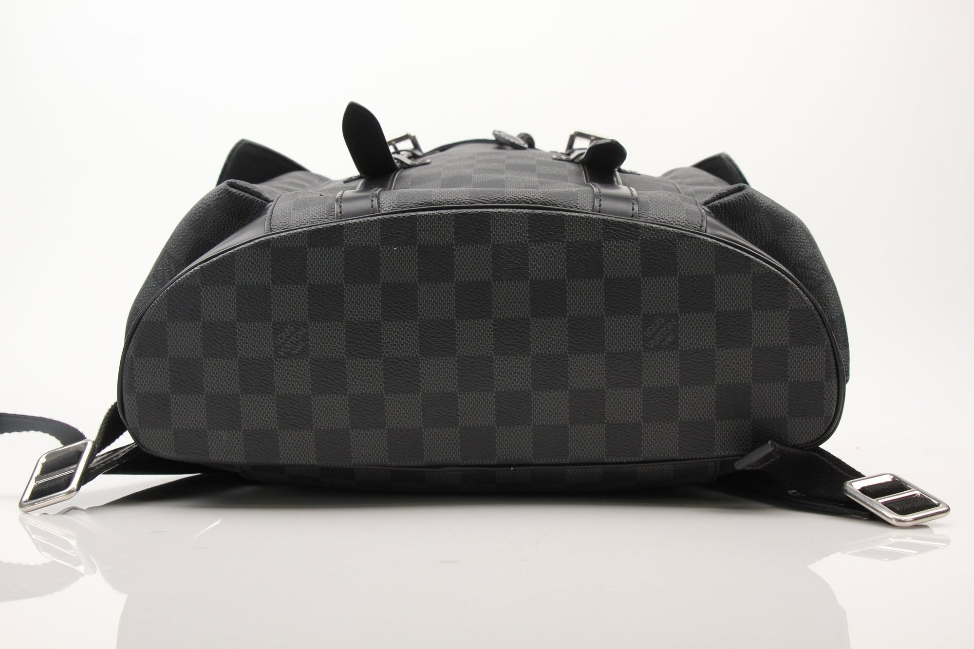 Louis Vuitton Christopher backpack, a stylish travel bag from Gold & Beyond, featuring sleek design and spacious compartments.