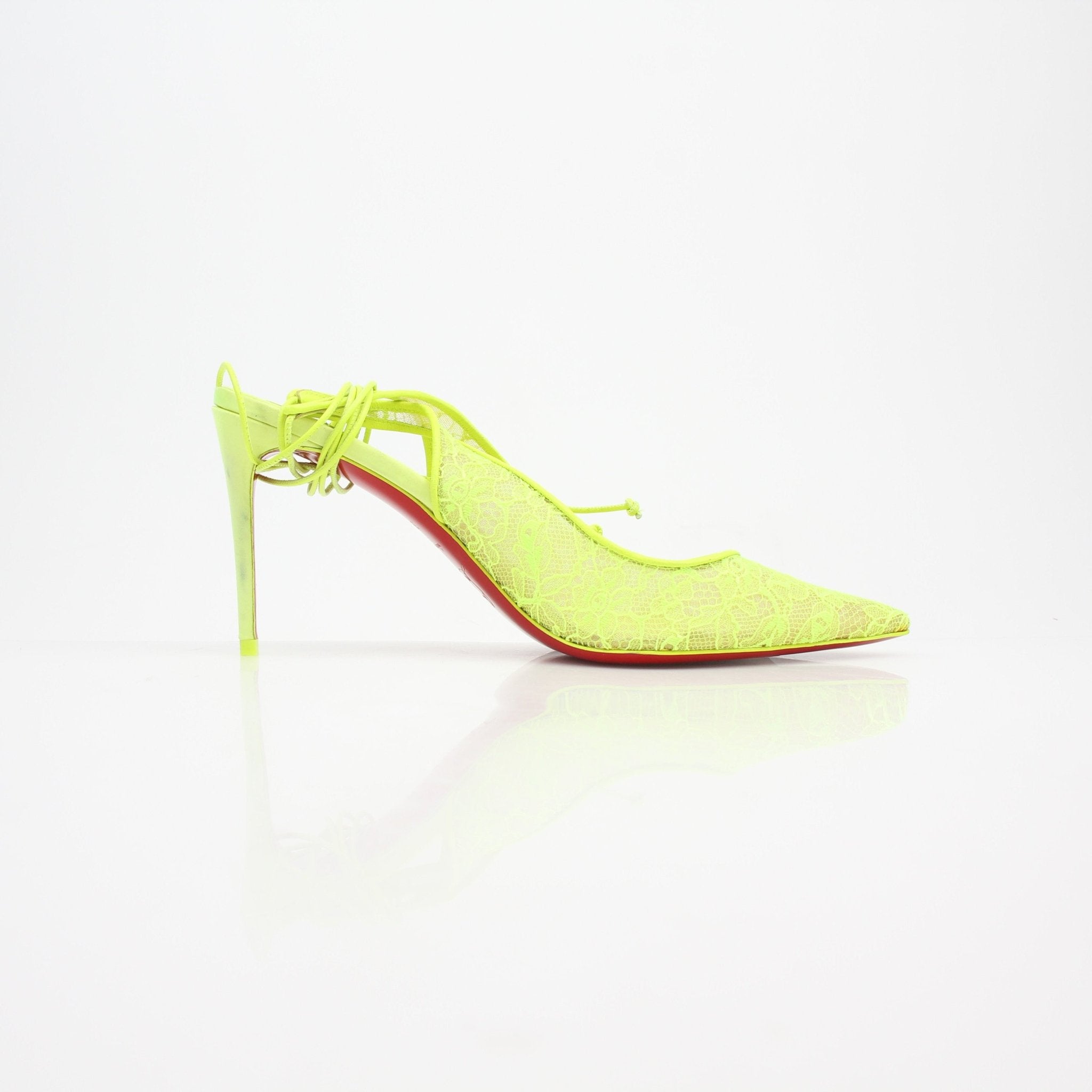 Christian Louboutin Lace Up Kate Slingback Heels with red sole, featuring black leather and elegant heel design.