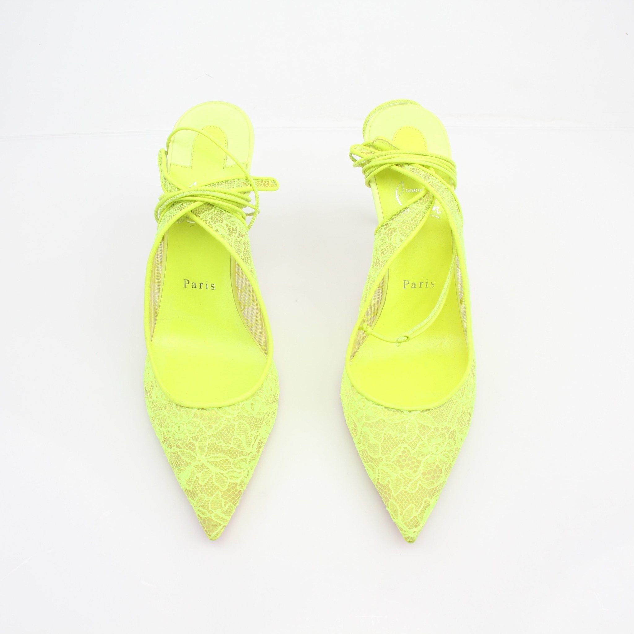 Gold & Beyond Christian Louboutin lace-up Kate slingback heels with pointed toes and red soles, stylish and elegant footwear.