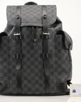 Louis Vuitton Christopher backpack from Gold & Beyond, stylish travel bag with signature monogram canvas and leather accents.