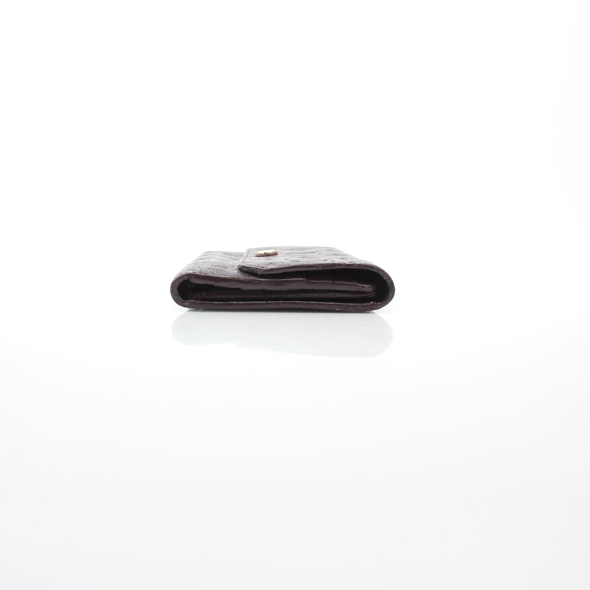 Louis Vuitton Monogram Empreinte Marie-Lou wallet in burgundy leather, front view with monogram texture