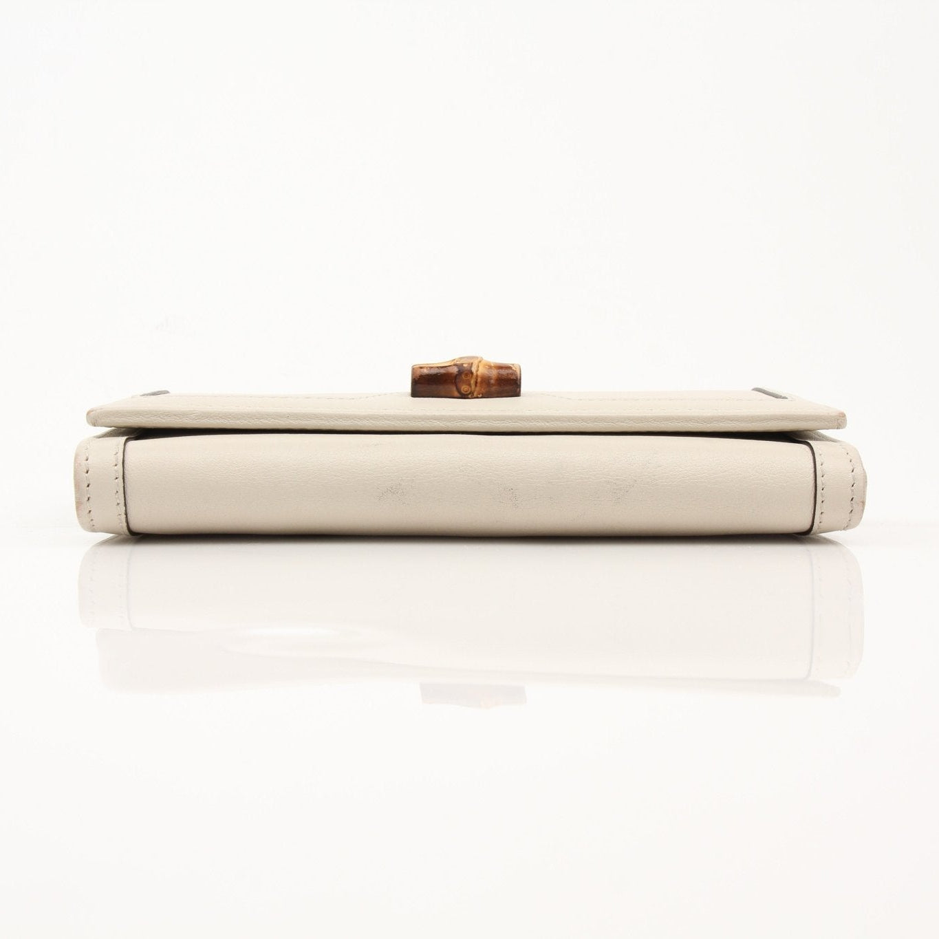 Gucci Diana Wallet by Gold & Beyond, stylish leather wallet with gold accents and multiple card slots, showcased on a neutral background.
