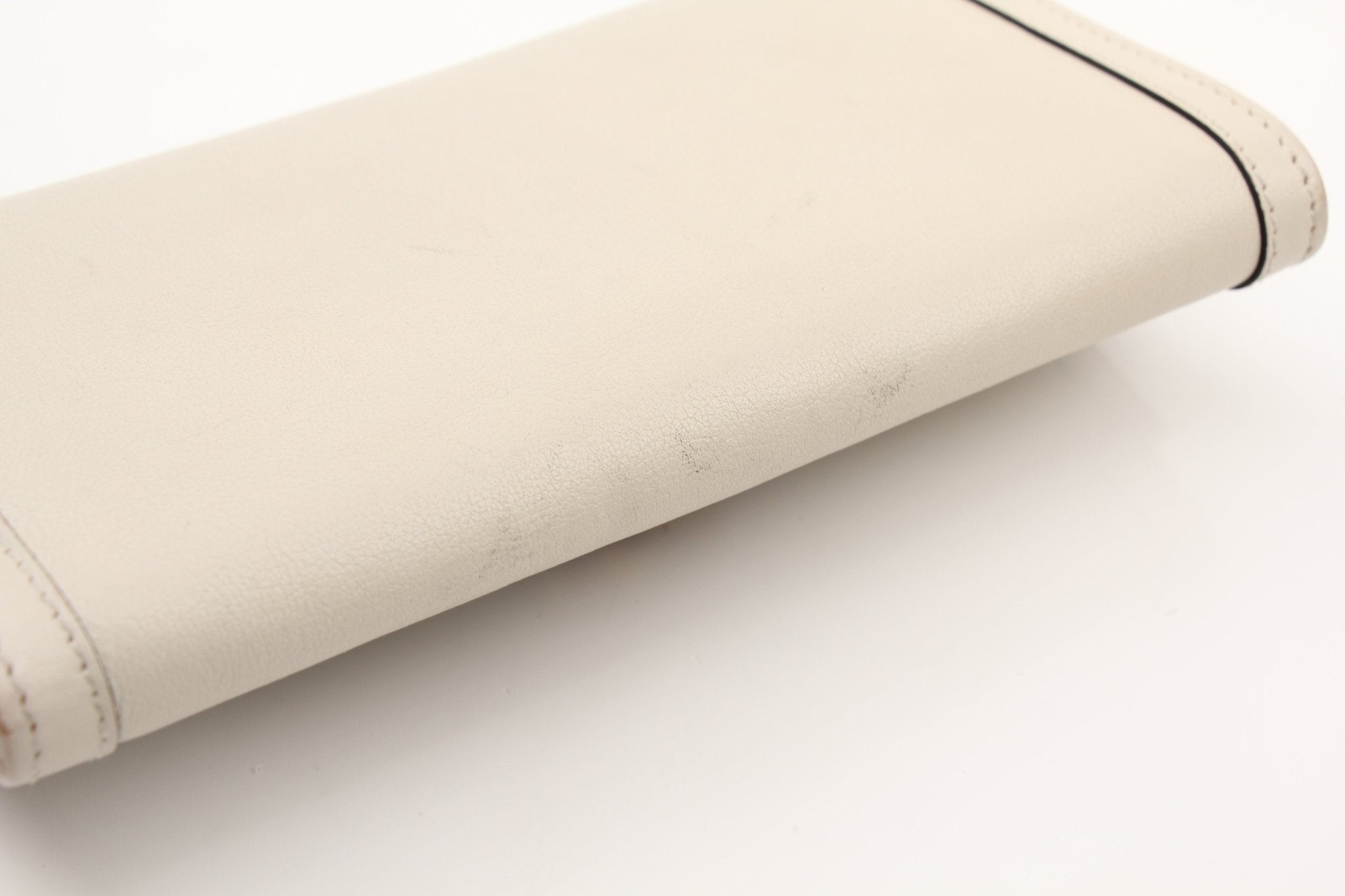 Gucci Diana Wallet by Gold & Beyond showing a stylish leather wallet with gold accents and signature Gucci branding.