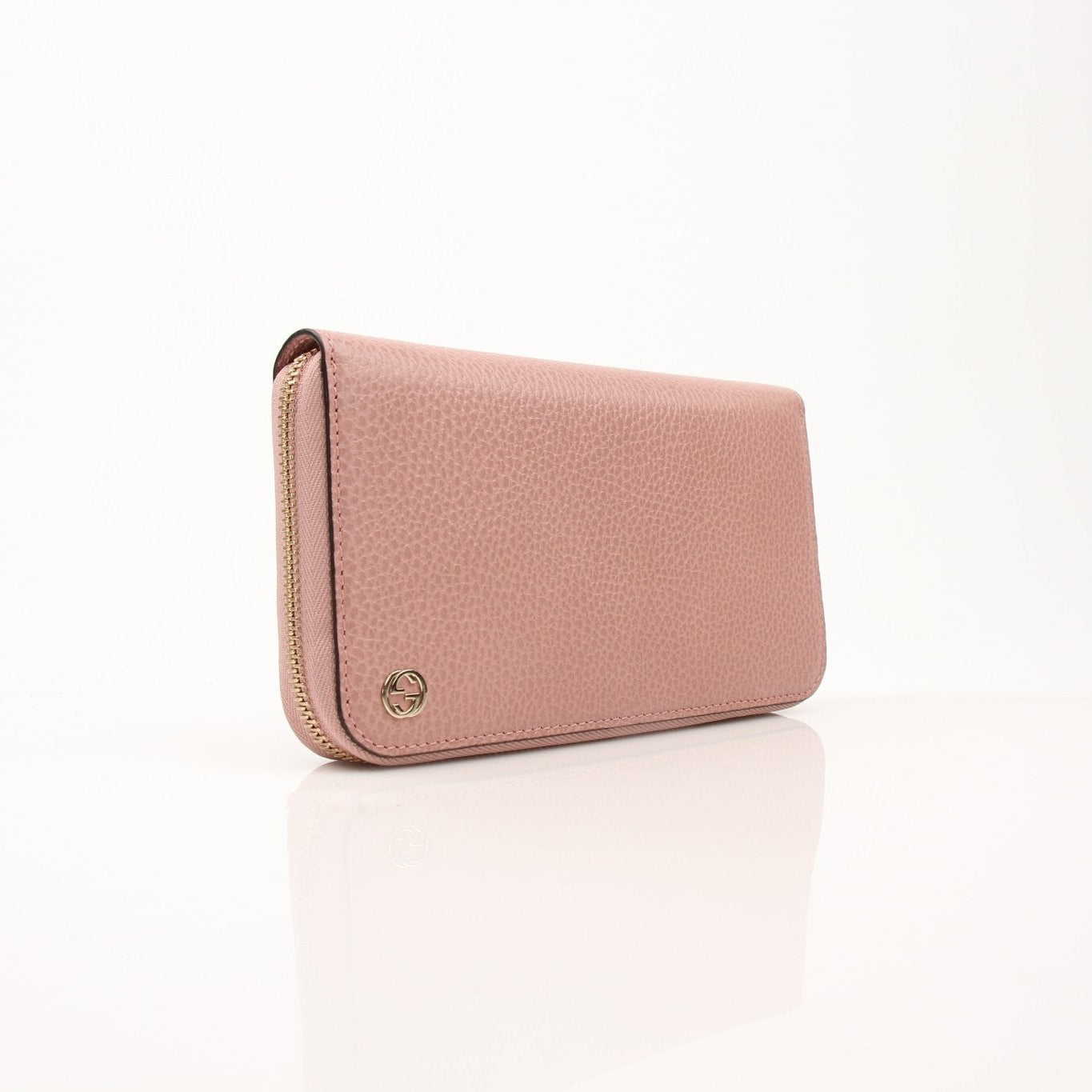 Gold & Beyond Gucci GG Logo Zip Continental wallet with black leather and gold-tone zipper detailing.