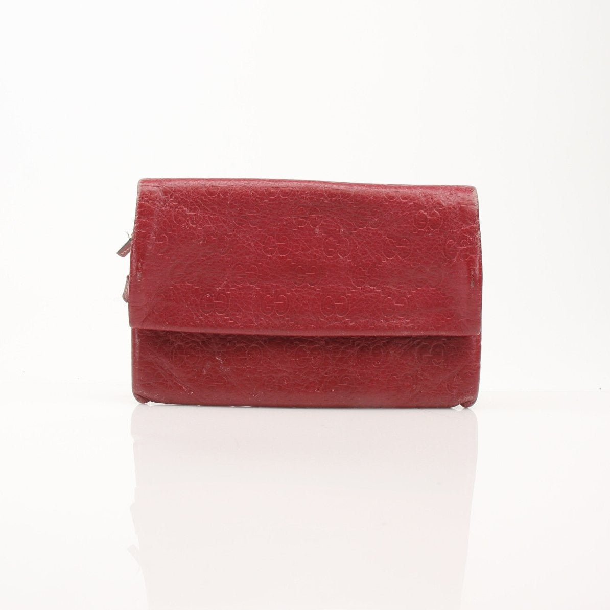Gold & Beyond Gucci Guccissima Continental wallet with embossed leather, featuring multiple card slots and a sleek design.