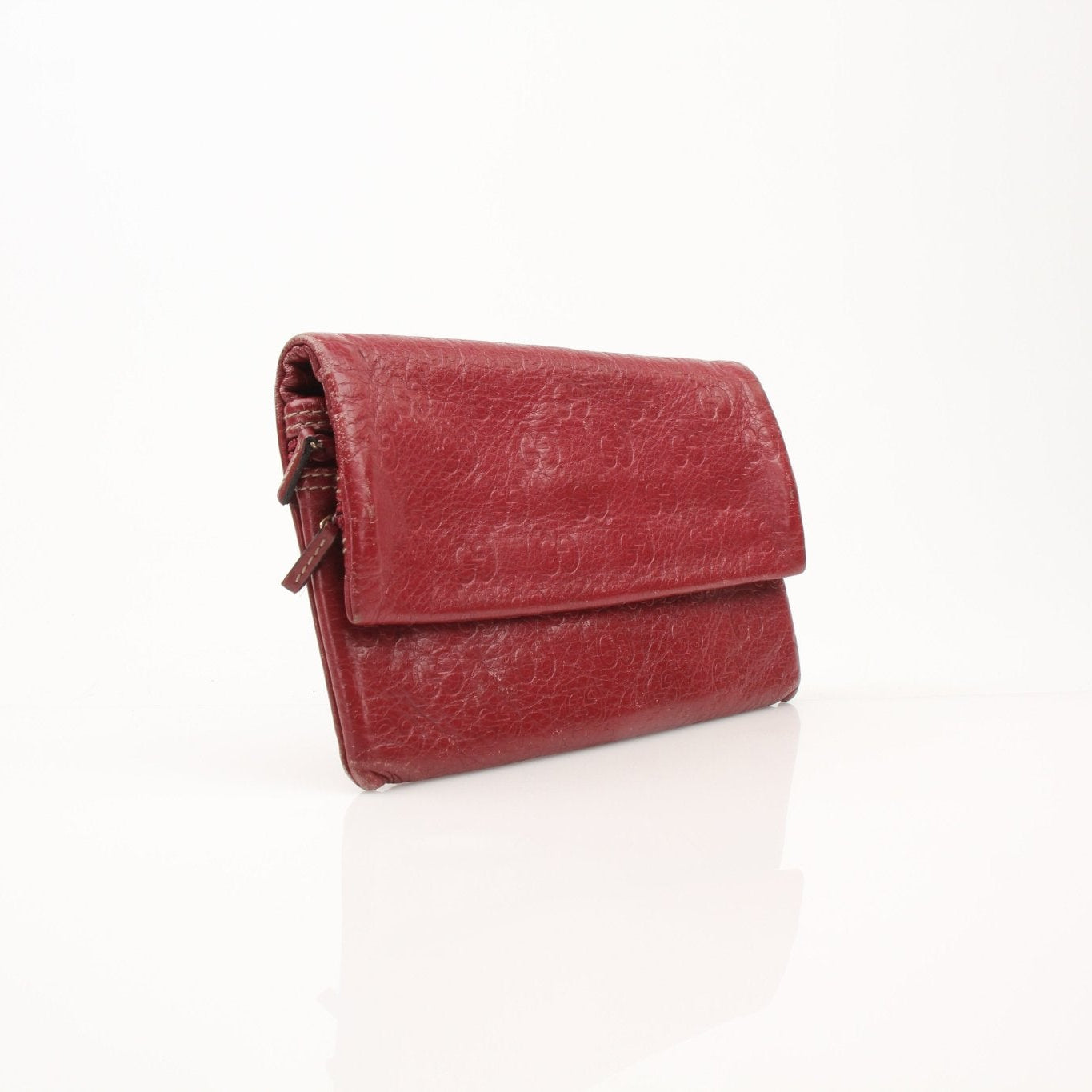 Gucci Guccissima Continental wallet by Gold & Beyond, featuring signature embossed leather with multiple card slots and a sleek design.