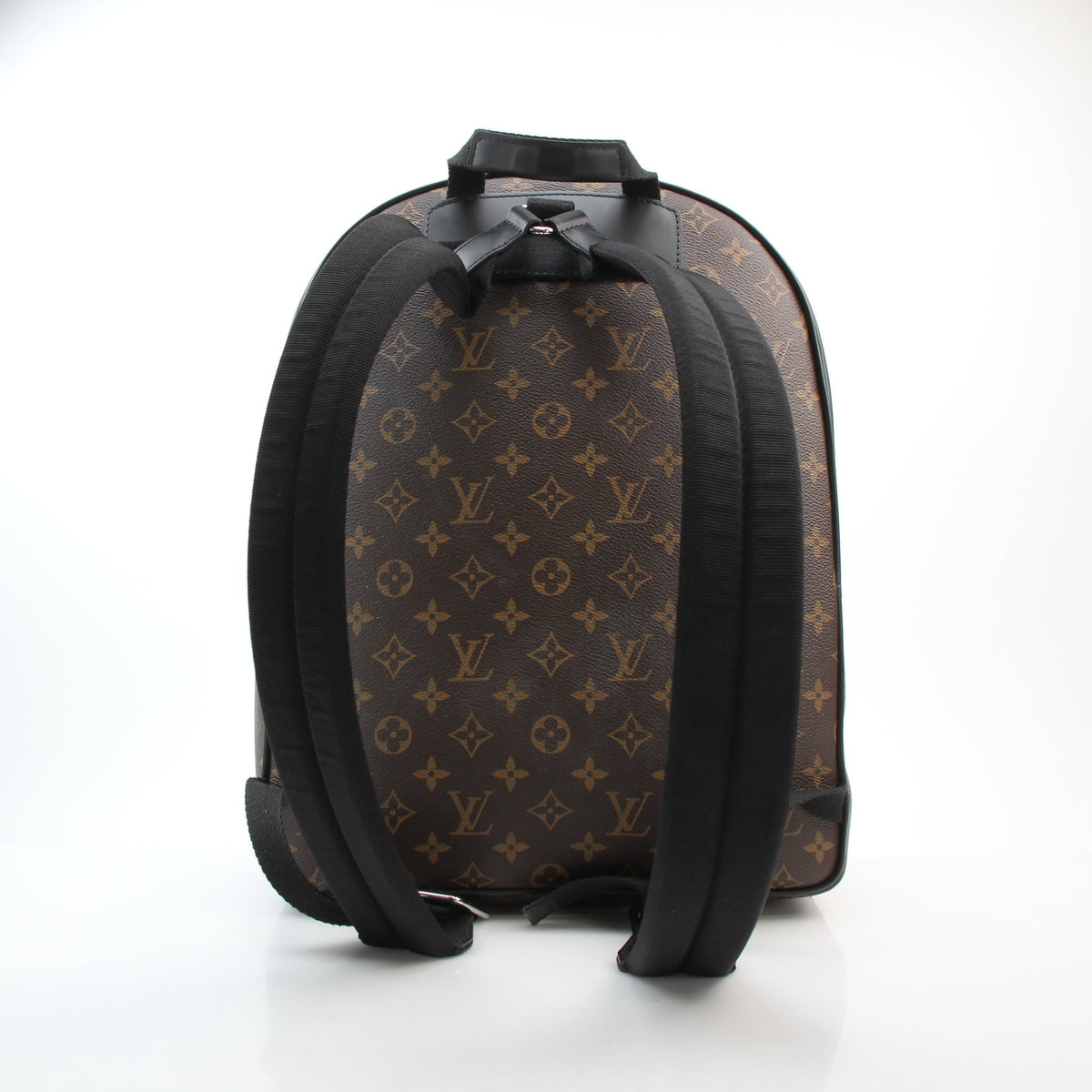 Louis Vuitton Monogram Canvas Josh backpack in brown, featuring adjustable shoulder straps and front pocket