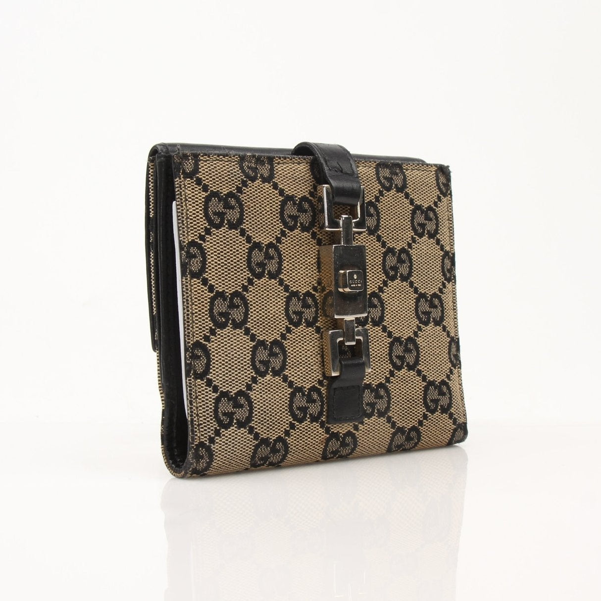Vintage Gucci Jackie GG wallet by Gold & Beyond, showcasing classic monogram canvas and leather trim, with multiple card slots.