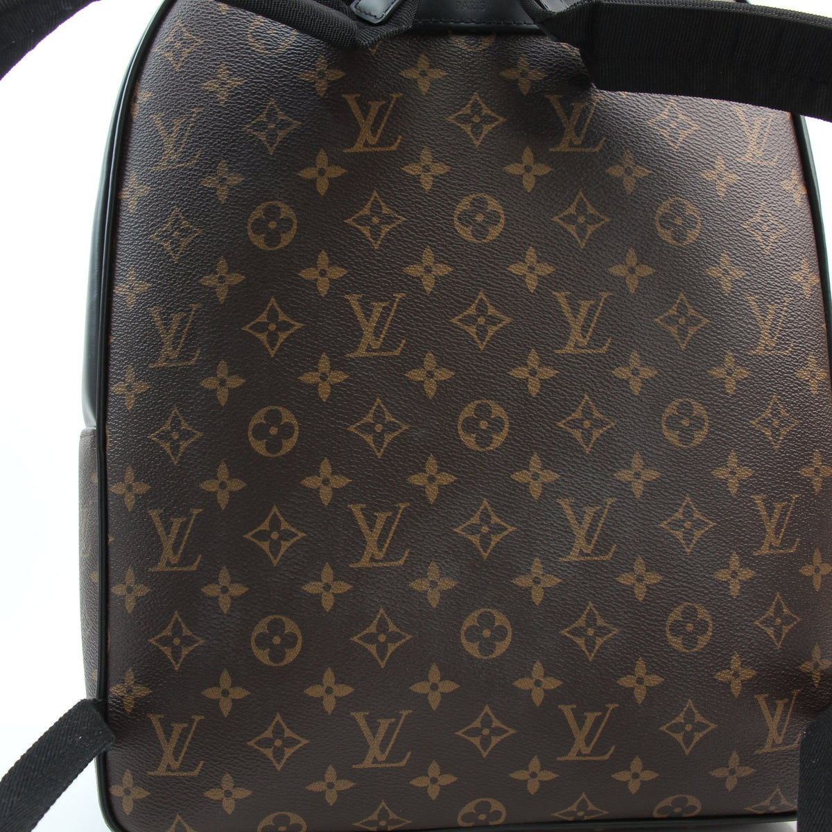 Louis Vuitton Monogram Canvas Josh backpack in brown, shown as a travel bag by Gold & Beyond