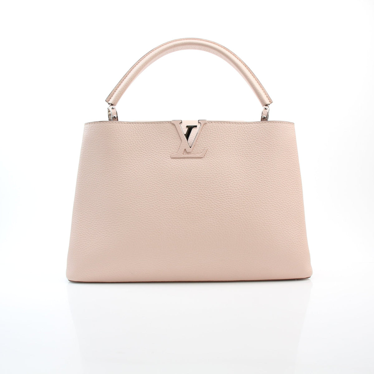 Louis Vuitton blush pink Taurillon leather Capucines GM top handle handbag with structured silhouette