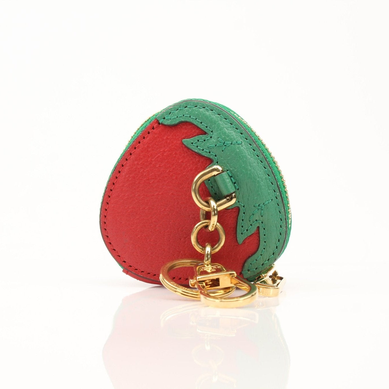Gucci Fruitini Zip Coin Pouch wallet with colorful fruit design and gold-toned zipper, on a neutral background.