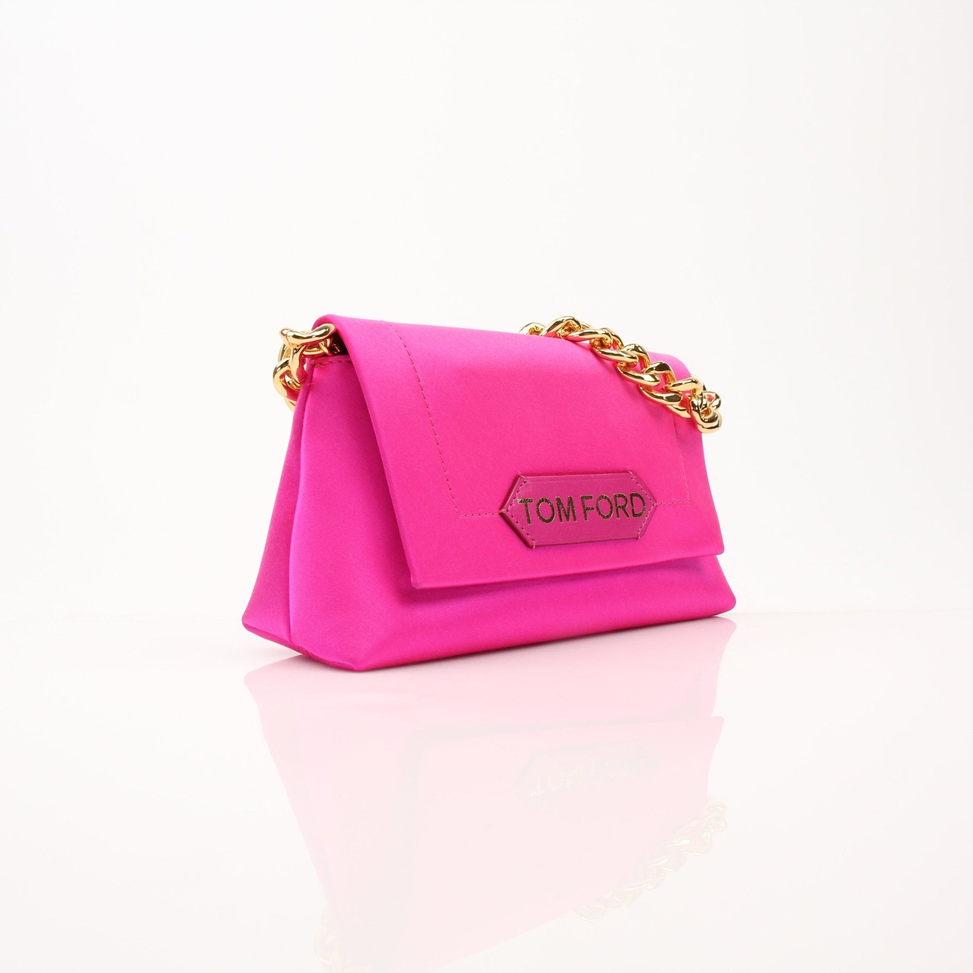 Gold & Beyond Tom Ford shoulder handbag, stylish leather handbag with gold accents, featuring a sleek design and top handle.