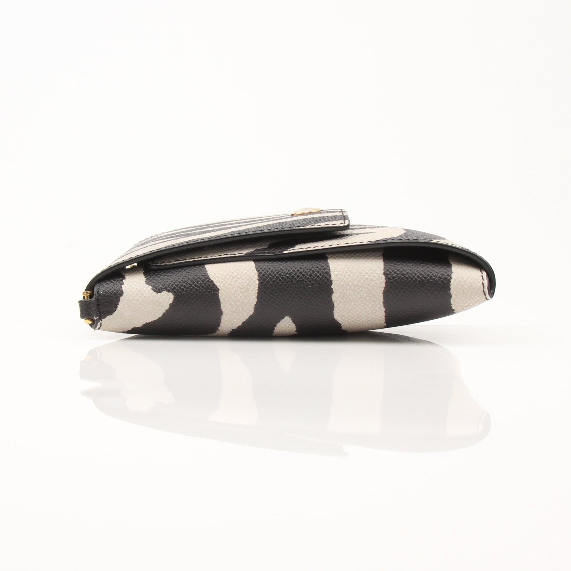 Gold & Beyond Tom Ford cell phone case accessory with sleek design and premium material, shown on a white background.