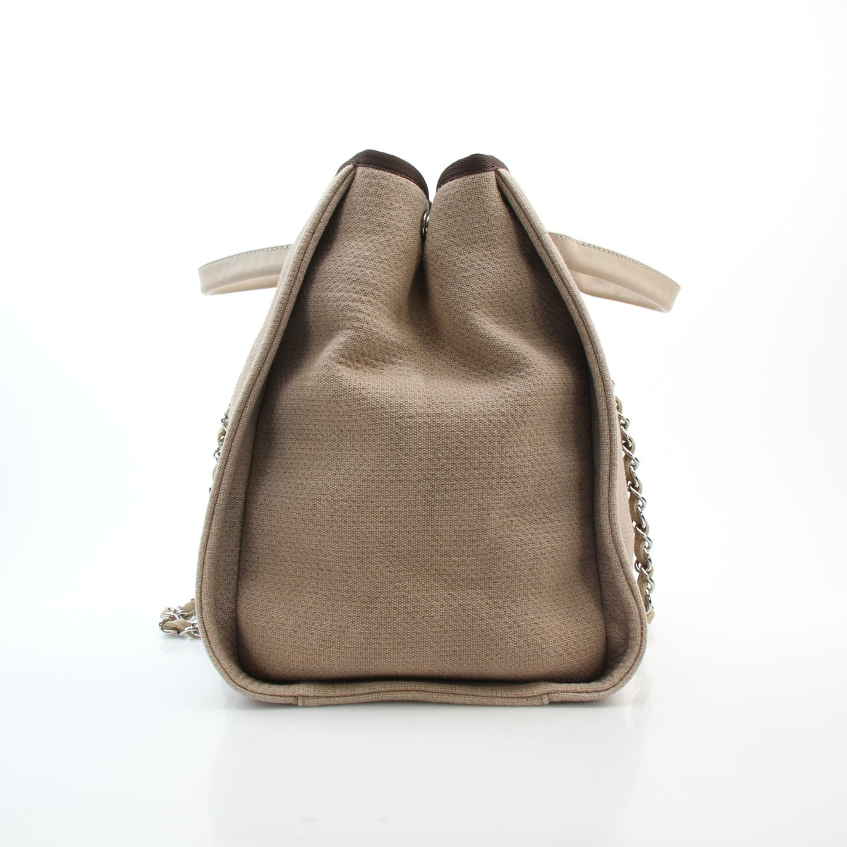 Beige woven canvas Deauville shopping tote bag by Chanel, large structured handbag with leather handles