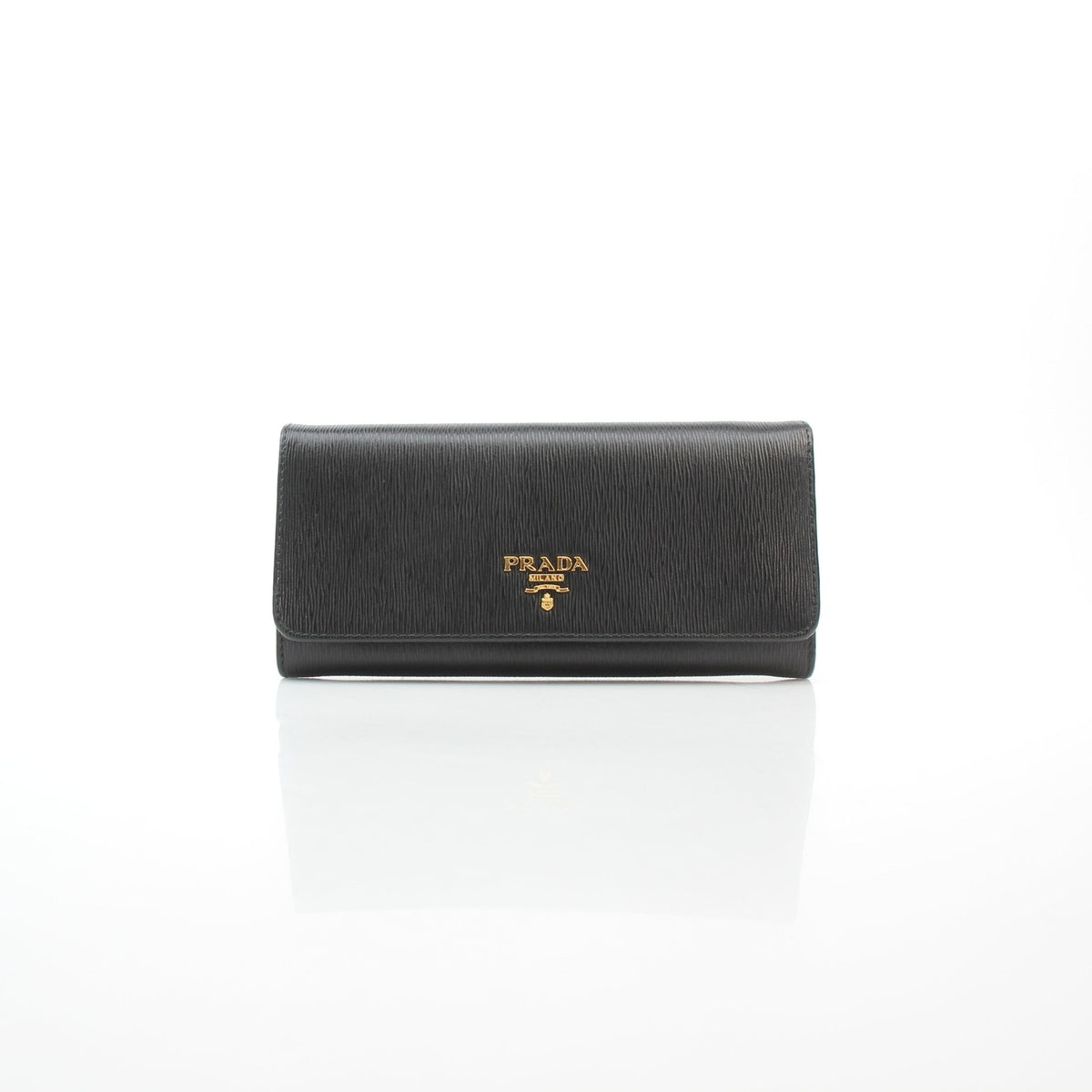 Black Prada Vitello Move leather flap wallet with compact design and gold-tone logo lettering
