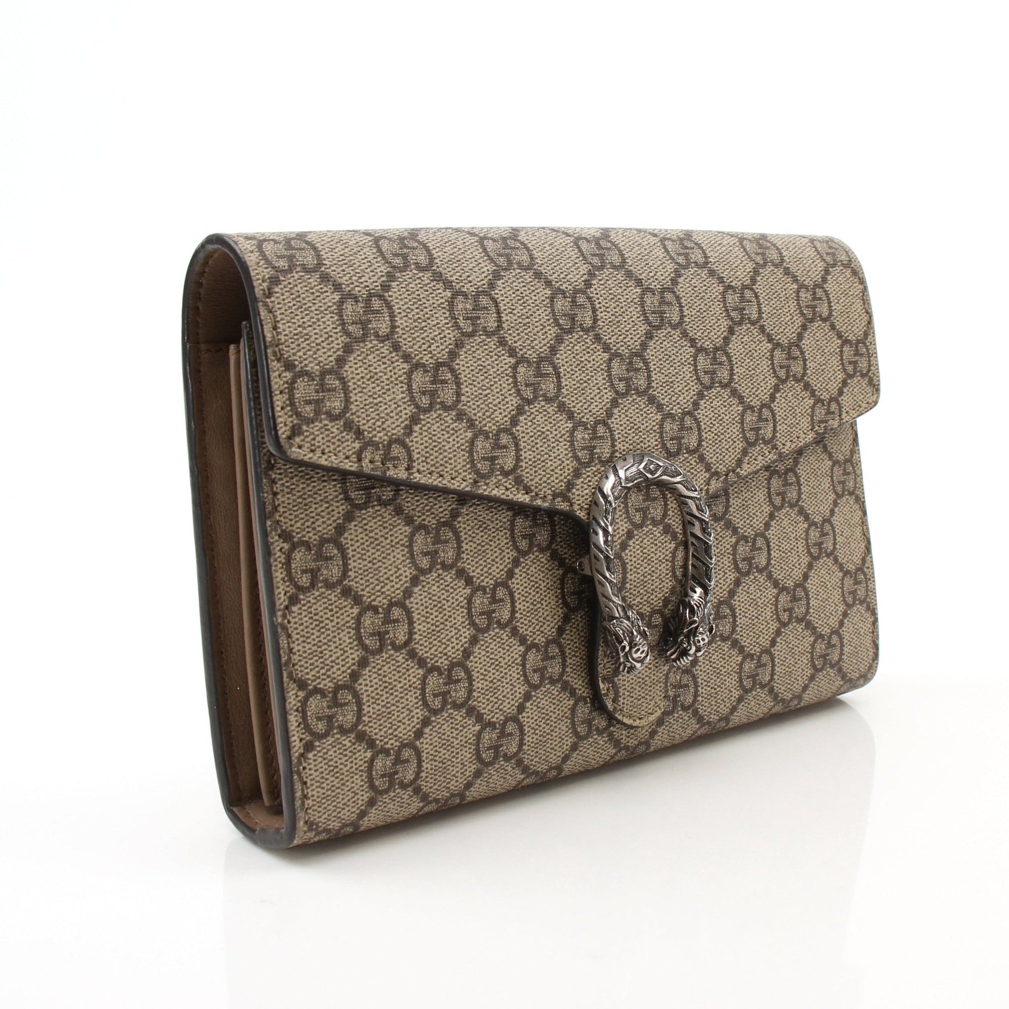 Gucci Dionysus GG Supreme mini handbag with gold hardware, featuring a structured design and signature pattern.