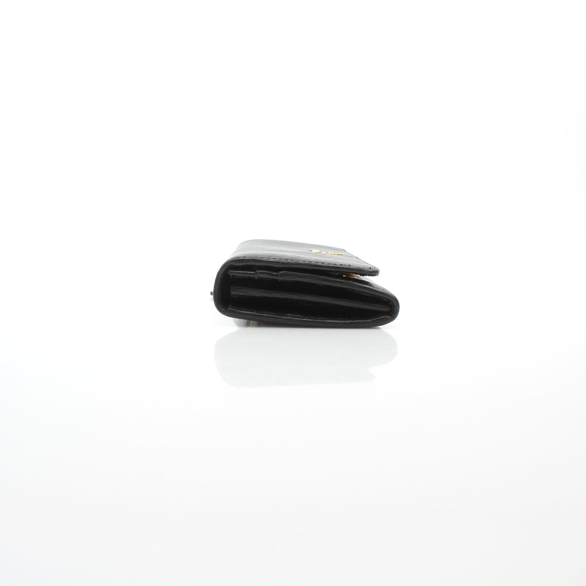 Prada black Vitello Move leather flap wallet with compact design and front flap closure