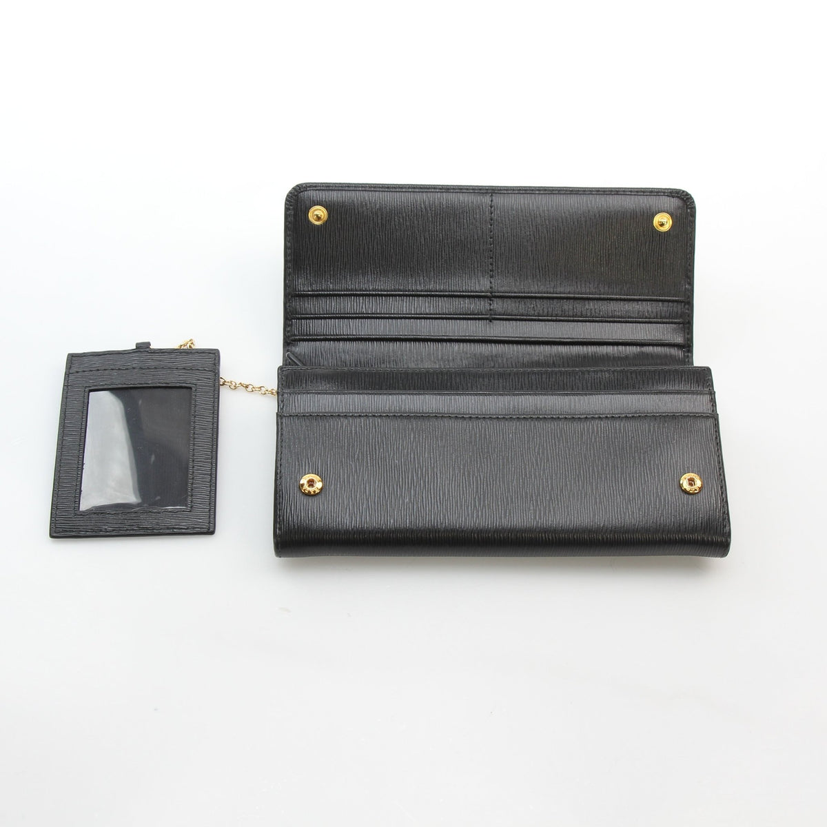 Prada black Vitello Move leather flap wallet with compact fold-over design