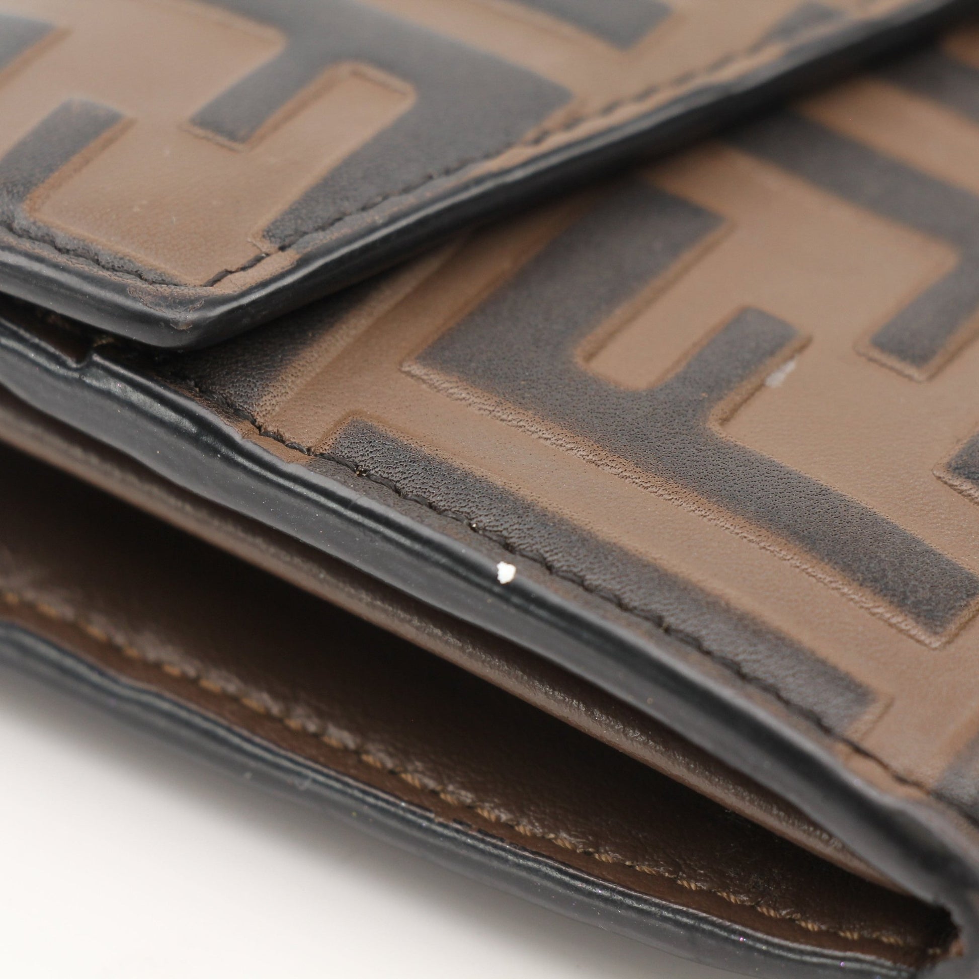 Gold & Beyond Fendi Wallet on Chain in black leather with gold hardware, featuring multiple card slots and a chain strap.
