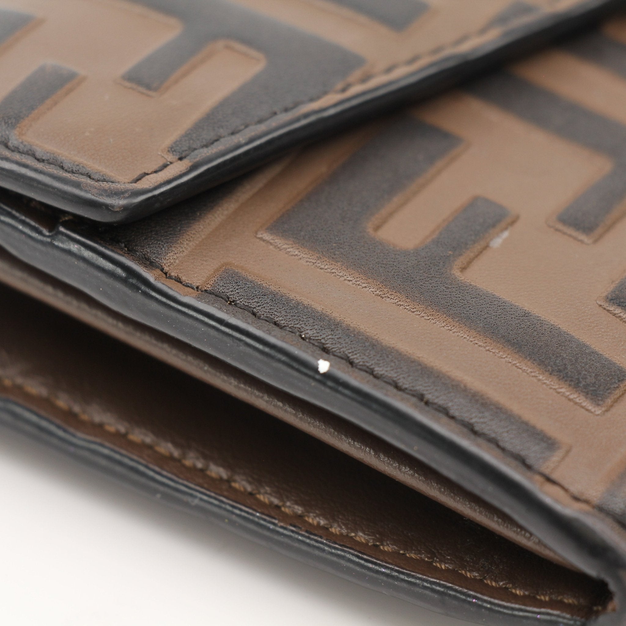 Gold & Beyond Fendi Wallet on Chain in black leather with gold hardware, featuring multiple card slots and a chain strap.