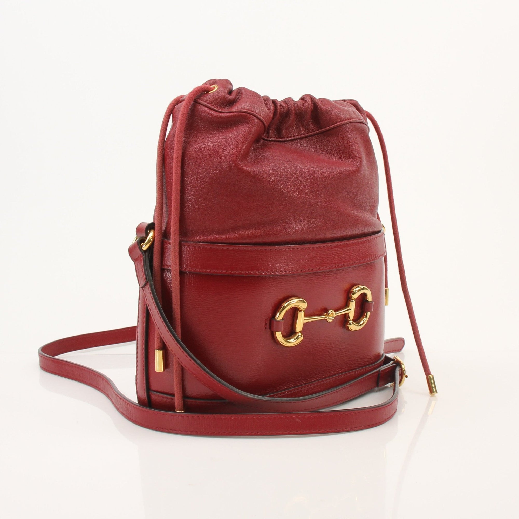 Gucci 1955 Horsebit bucket handbag with leather and gold hardware, stylish accessory by Gold & Beyond.