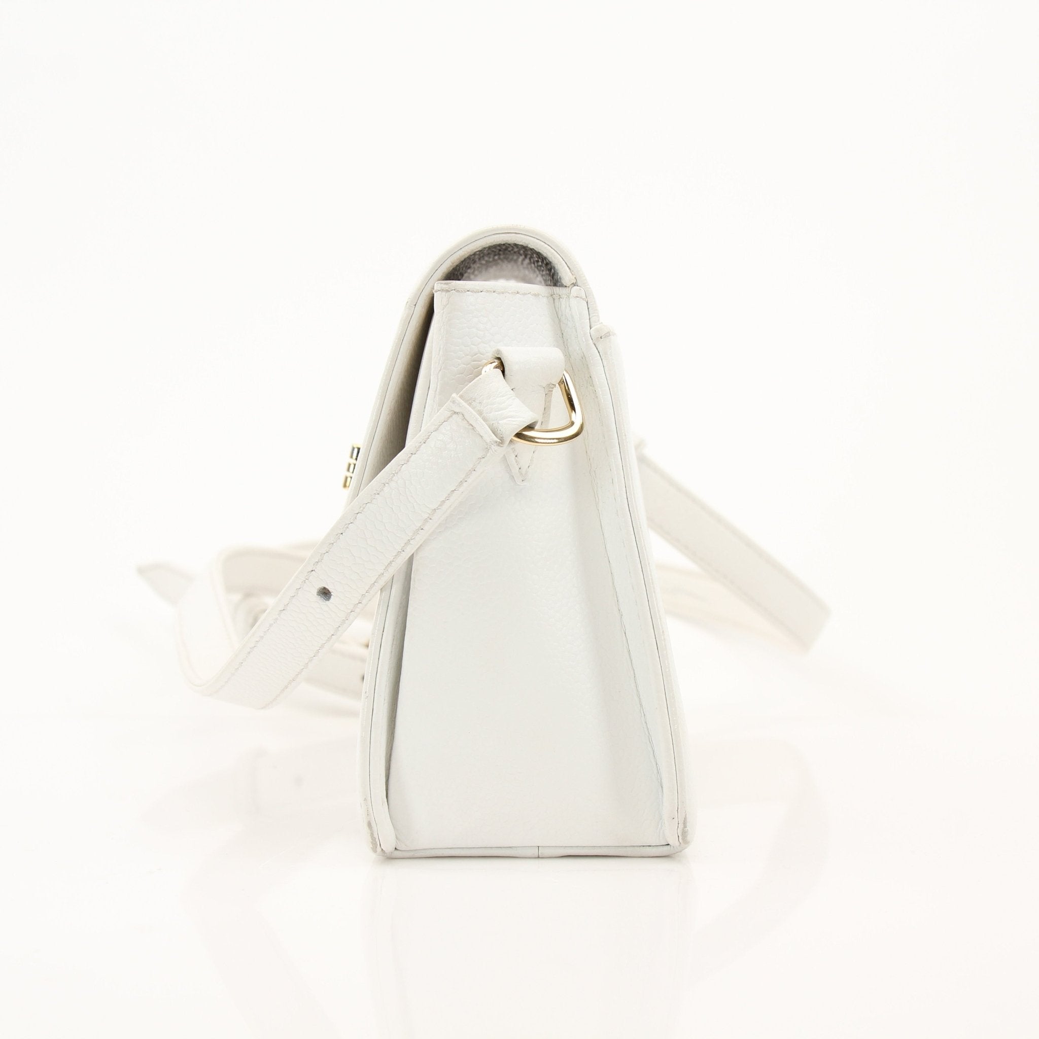 Gold & Beyond Chanel White Caviar Crossbody Bag handbag with gold chain strap and textured caviar leather.