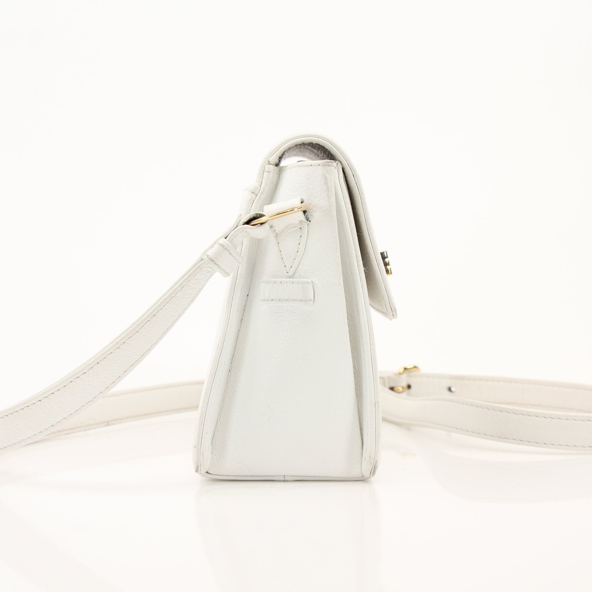 Chanel White Caviar Crossbody Bag, luxury handbag with quilted leather and gold-tone hardware, stylish and elegant.