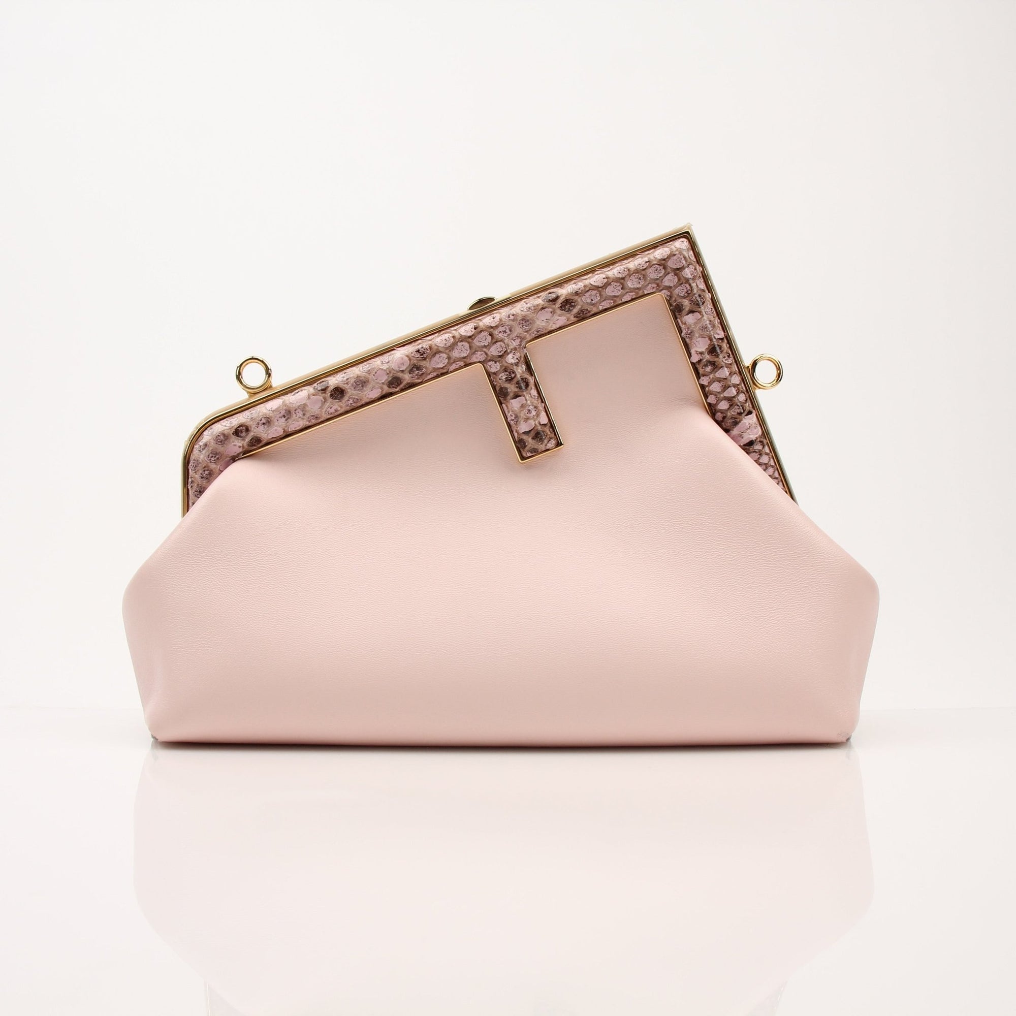 Gold & Beyond Fendi First Small Clutch handbag with sleek design, gold hardware, and textured leather, shown from a front view.