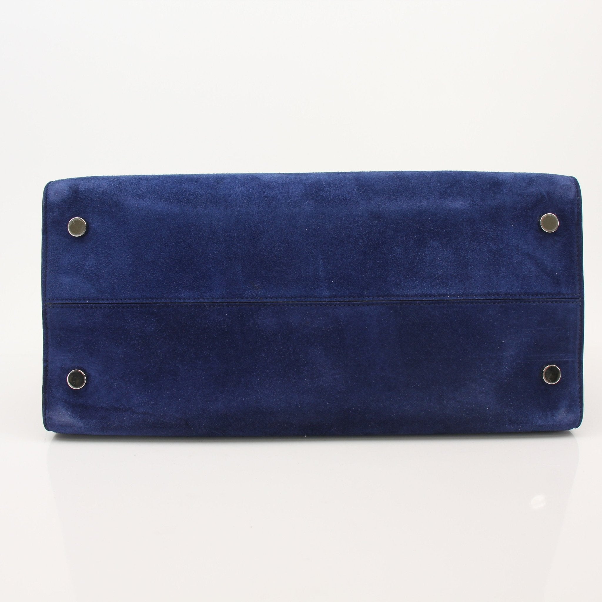 Gold & Beyond Dior "DiorEver" large top handle handbag with sleek design and structured silhouette.
