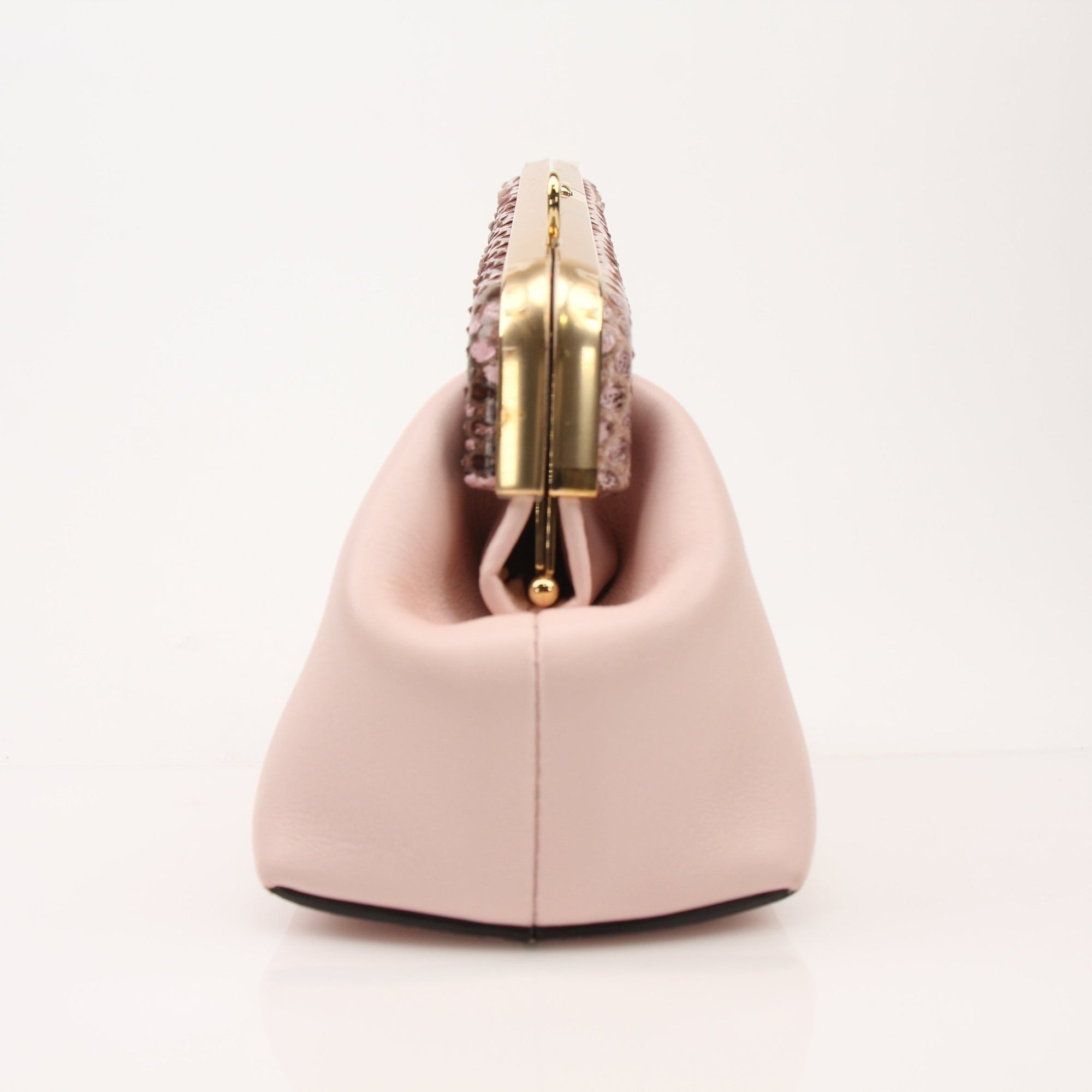 Small Fendi First clutch handbag in gold with sleek design and subtle logo details, perfect for elegant evening wear.