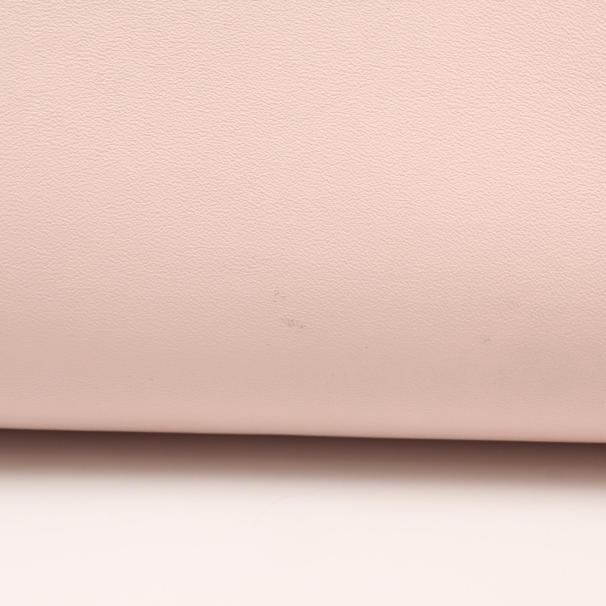 Fendi First Small Clutch handbag by Gold & Beyond, featuring sleek design and elegant leather finish.
