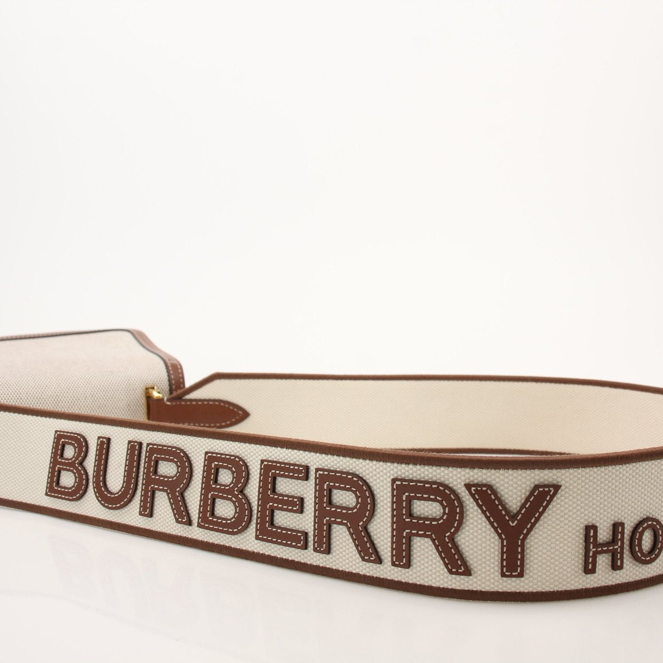 Gold & Beyond small Burberry crossbody handbag with signature check pattern and leather accents.