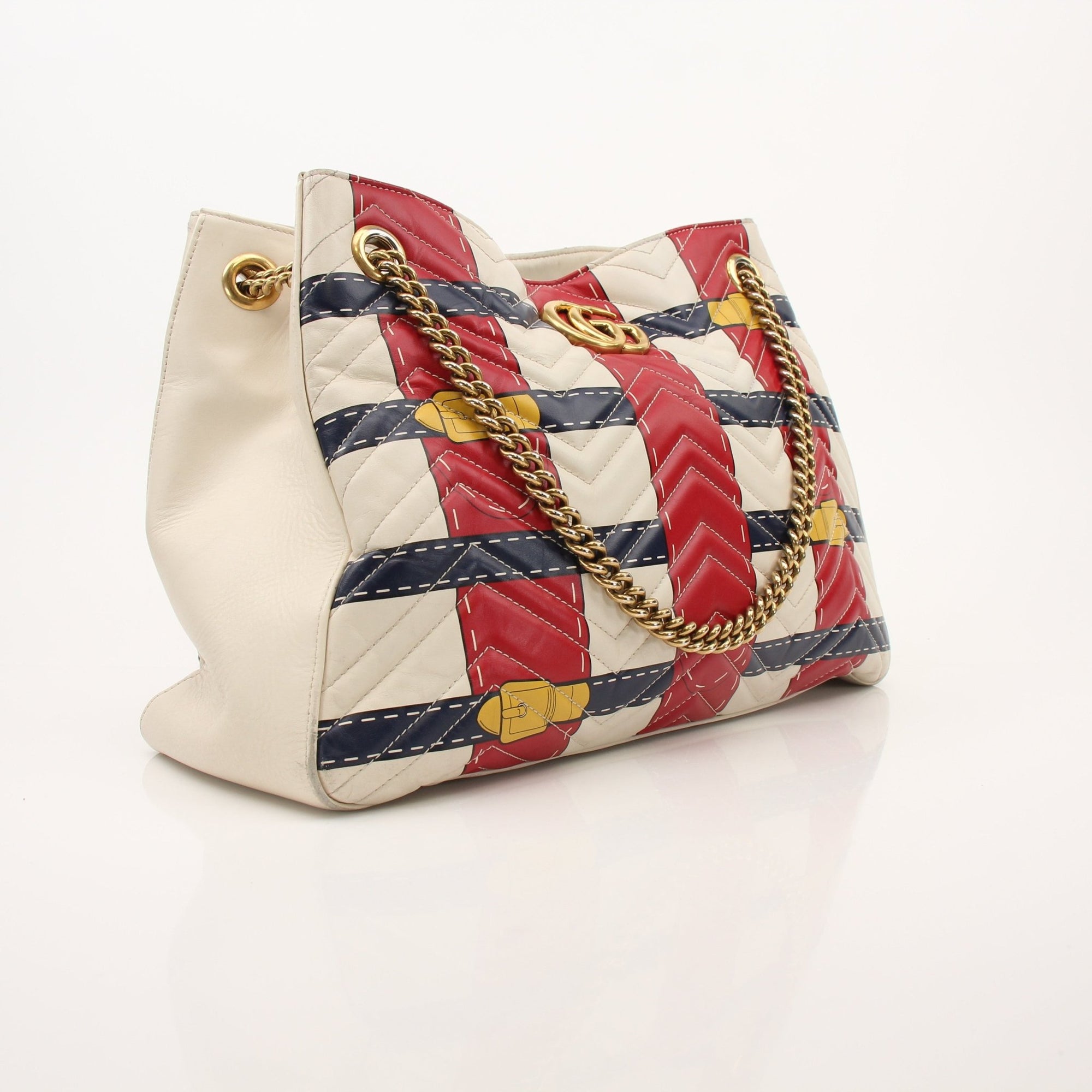 Gold & Beyond Gucci Trompe L’oeil GG shoulder handbag with logo and stylish design, featuring a sleek leather strap and structured silhouette.