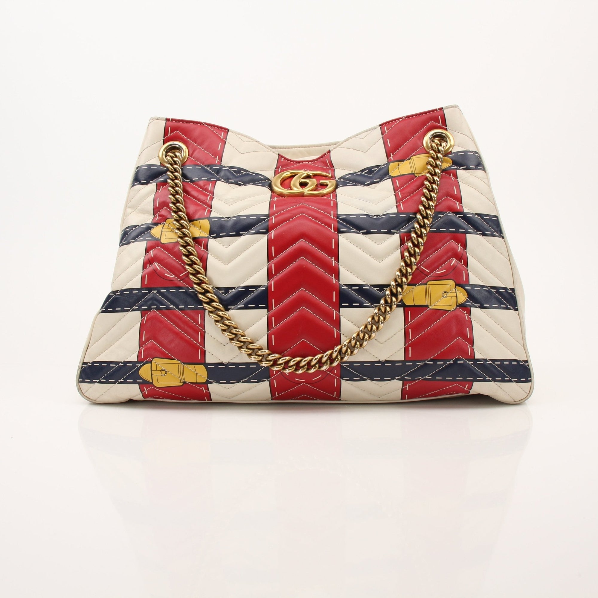 Gucci Trompe L’oeil GG shoulder handbag with black leather strap and gold hardware, featuring a distinctive eye-catching design.