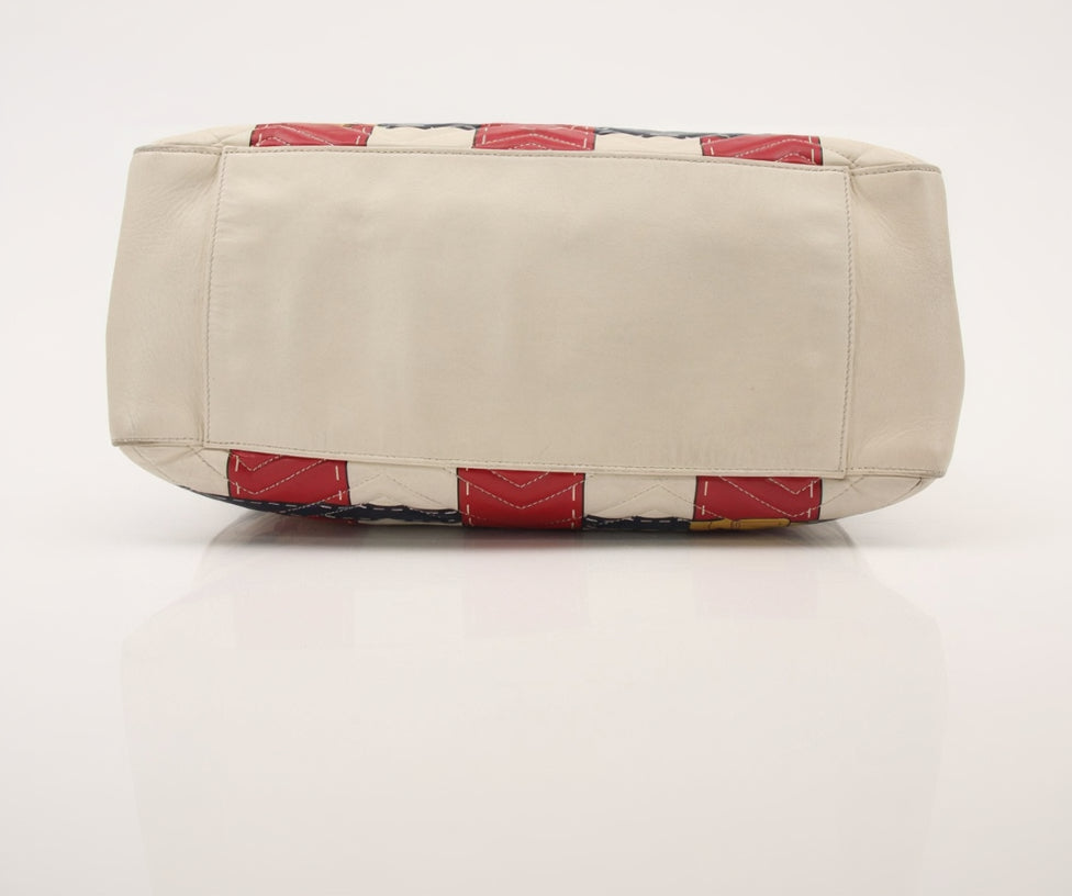 Gucci Trompe L’oeil GG shoulder handbag with leather strap and gold accents, stylish designer accessory by Gold & Beyond.