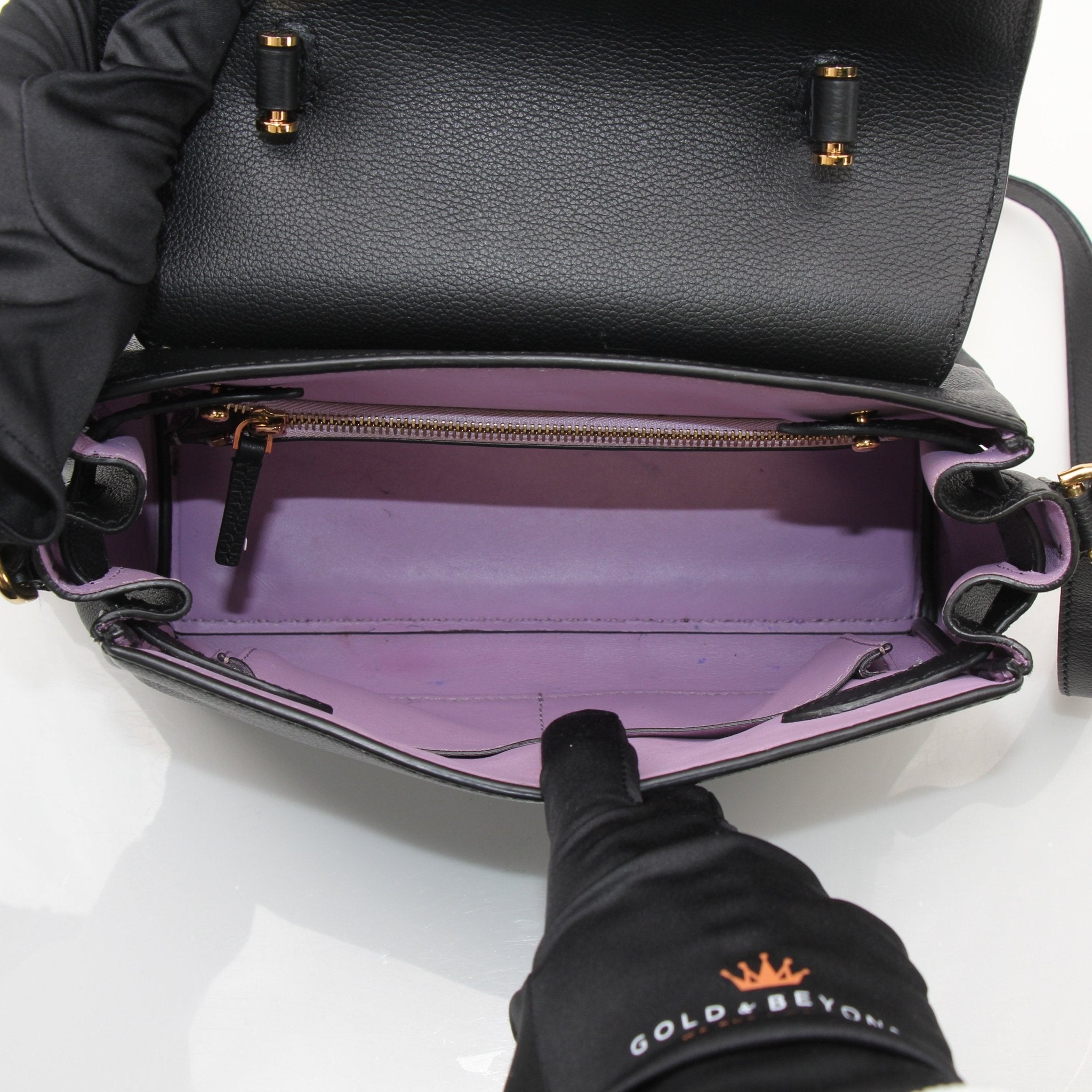 Gold & Beyond Versace La Medusa handbag with gold chain strap and iconic Medusa logo, stylish and luxurious accessory.