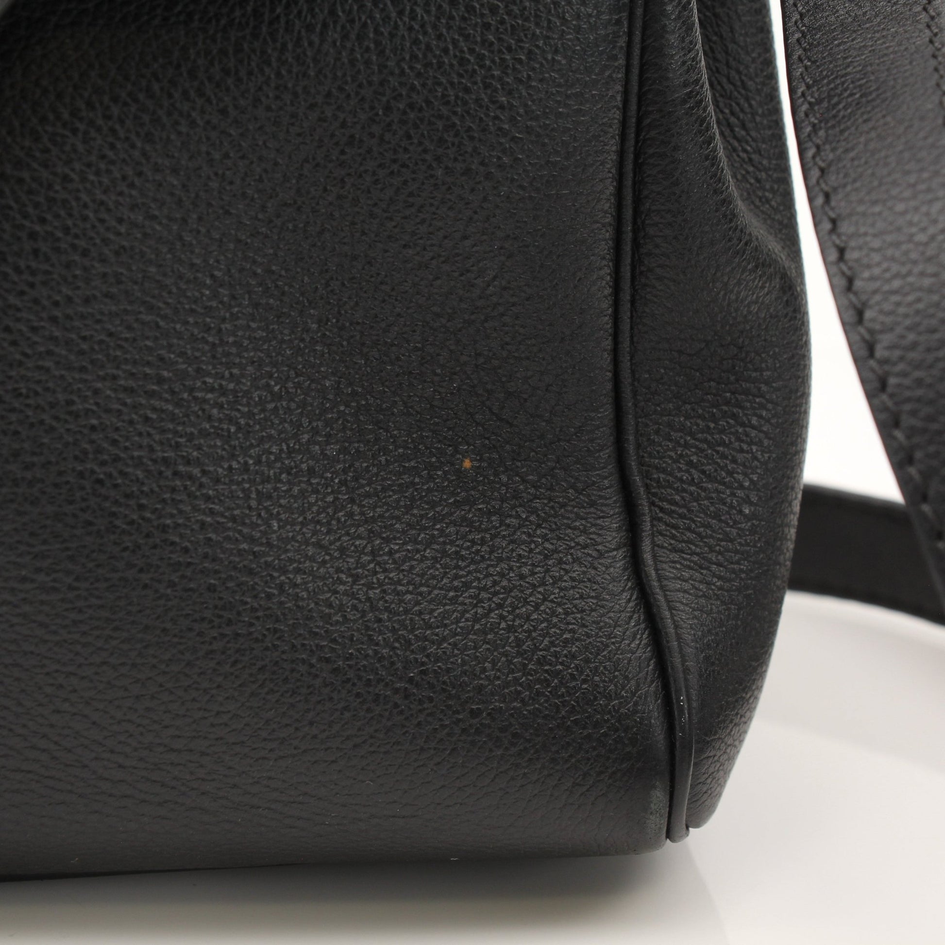 Gold & Beyond Versace La Medusa handbag featuring a gold-tone chain strap and iconic Medusa logo on black leather.