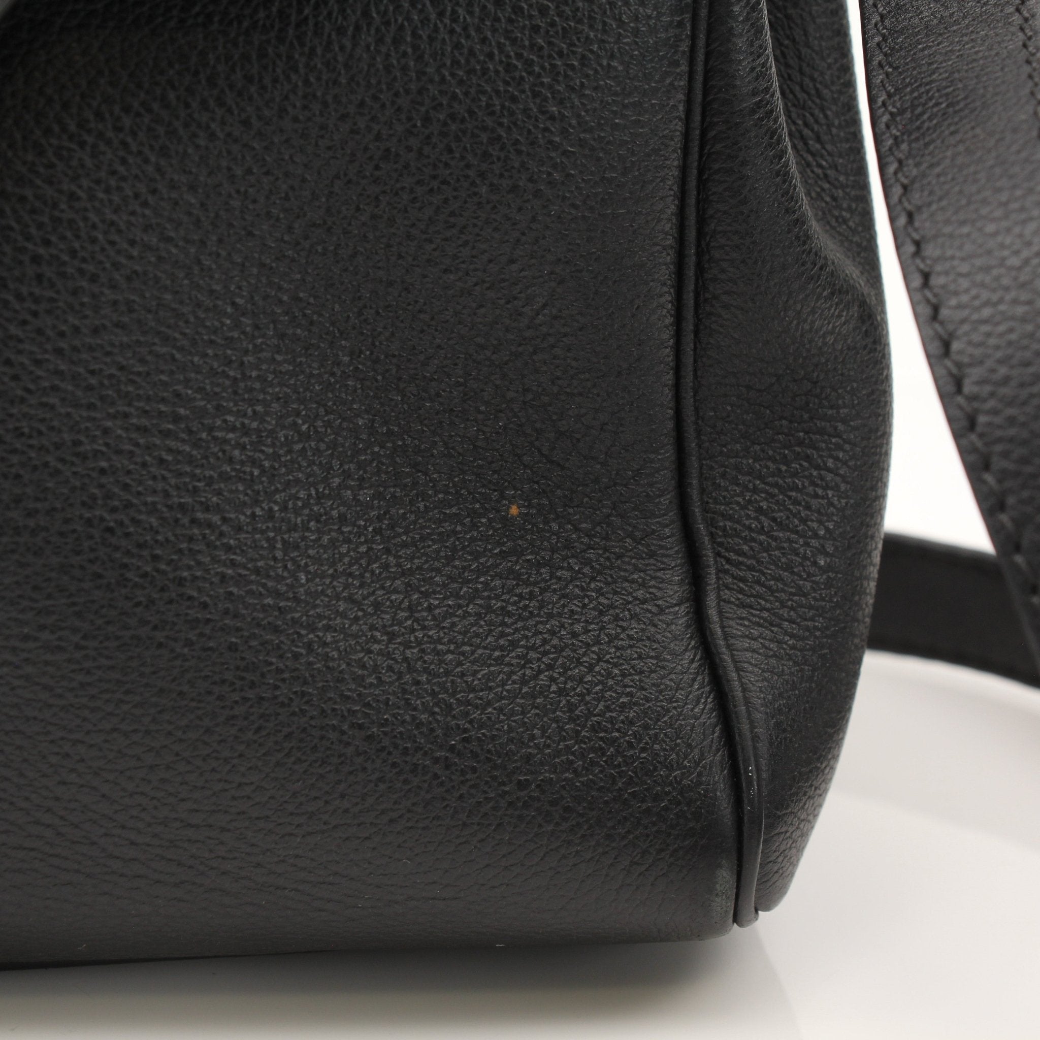 Gold & Beyond Versace La Medusa handbag featuring a gold-tone chain strap and iconic Medusa logo on black leather.