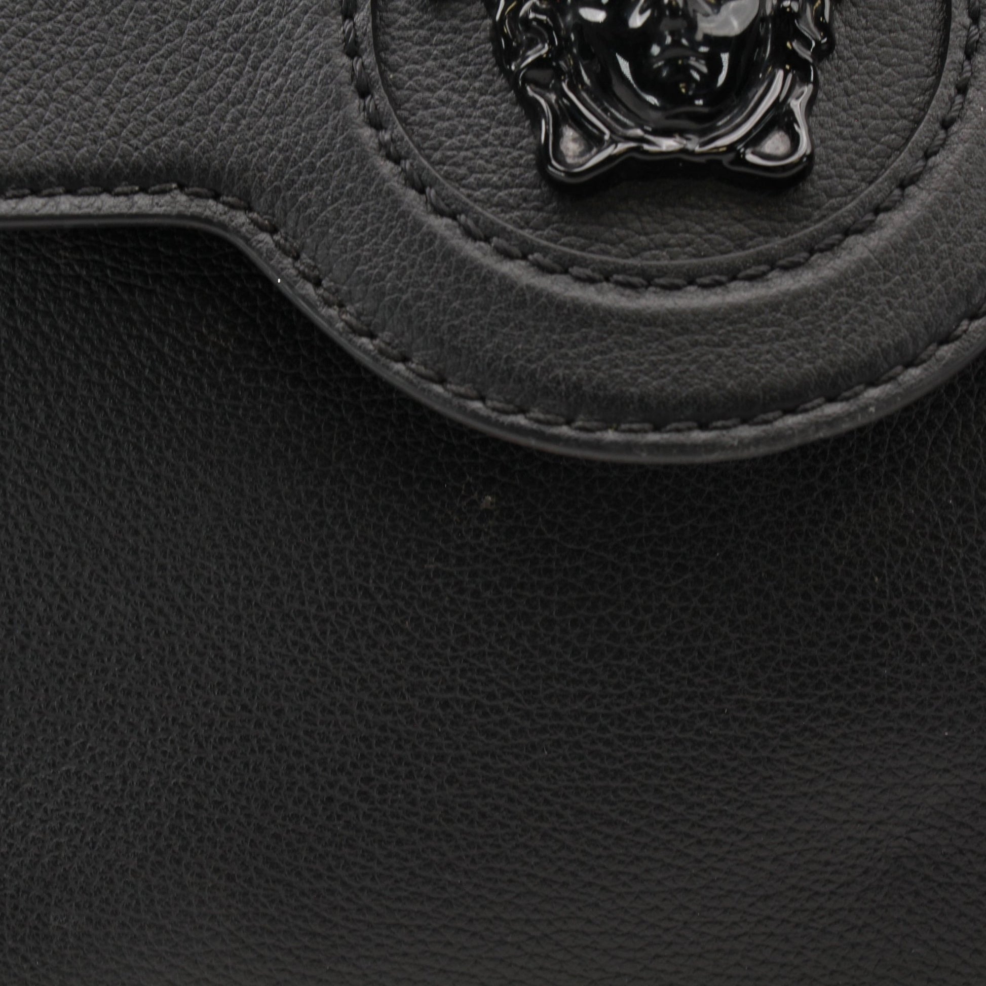 Gold & Beyond Versace La Medusa handbag with gold hardware and signature Medusa logo, stylish and elegant handbag for women.