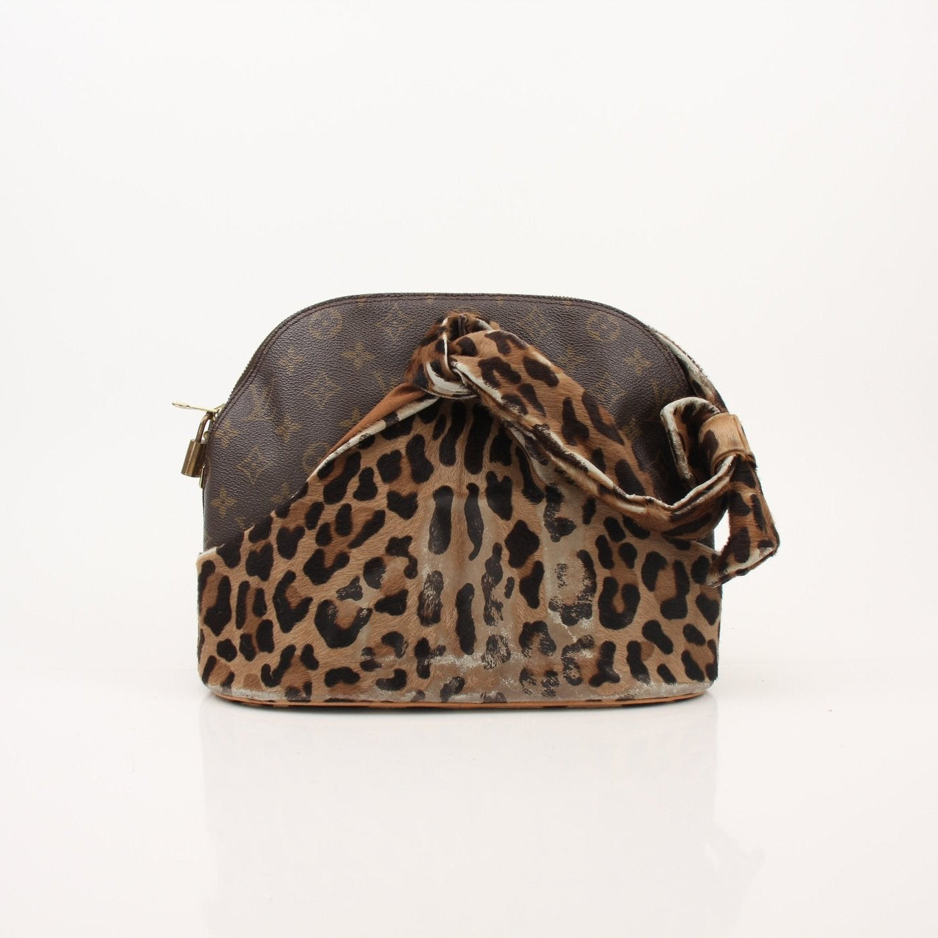 Louis Vuitton x ALAÏA designer handbag with gold accents, crafted by Gold & Beyond, featuring luxurious leather and stylish details.