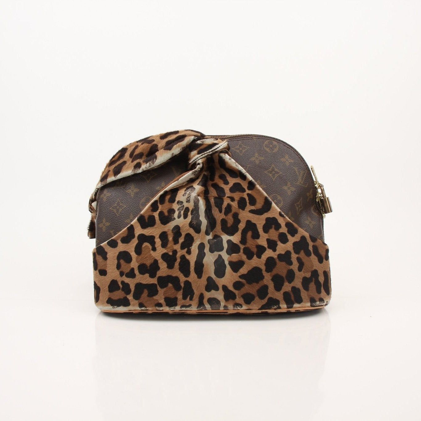 Louis Vuitton x ALAÏA limited edition vintage leopard bag by Gold & Beyond, featuring leopard print leather and gold accents.