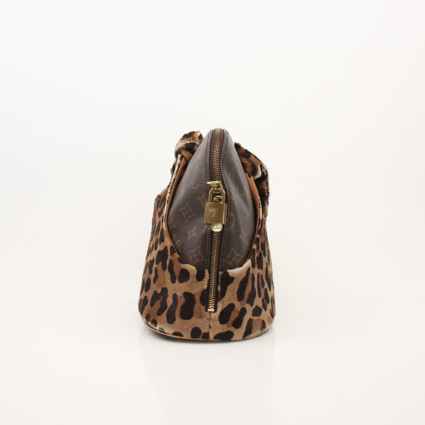 Louis Vuitton x ALAÏA handbag by Gold & Beyond, showcasing a luxurious designer tote with gold accents and intricate details.