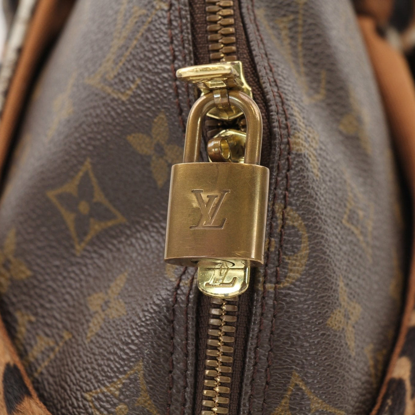 Louis Vuitton x ALAÏA handbag featuring a luxurious design with gold accents, crafted by Gold & Beyond.