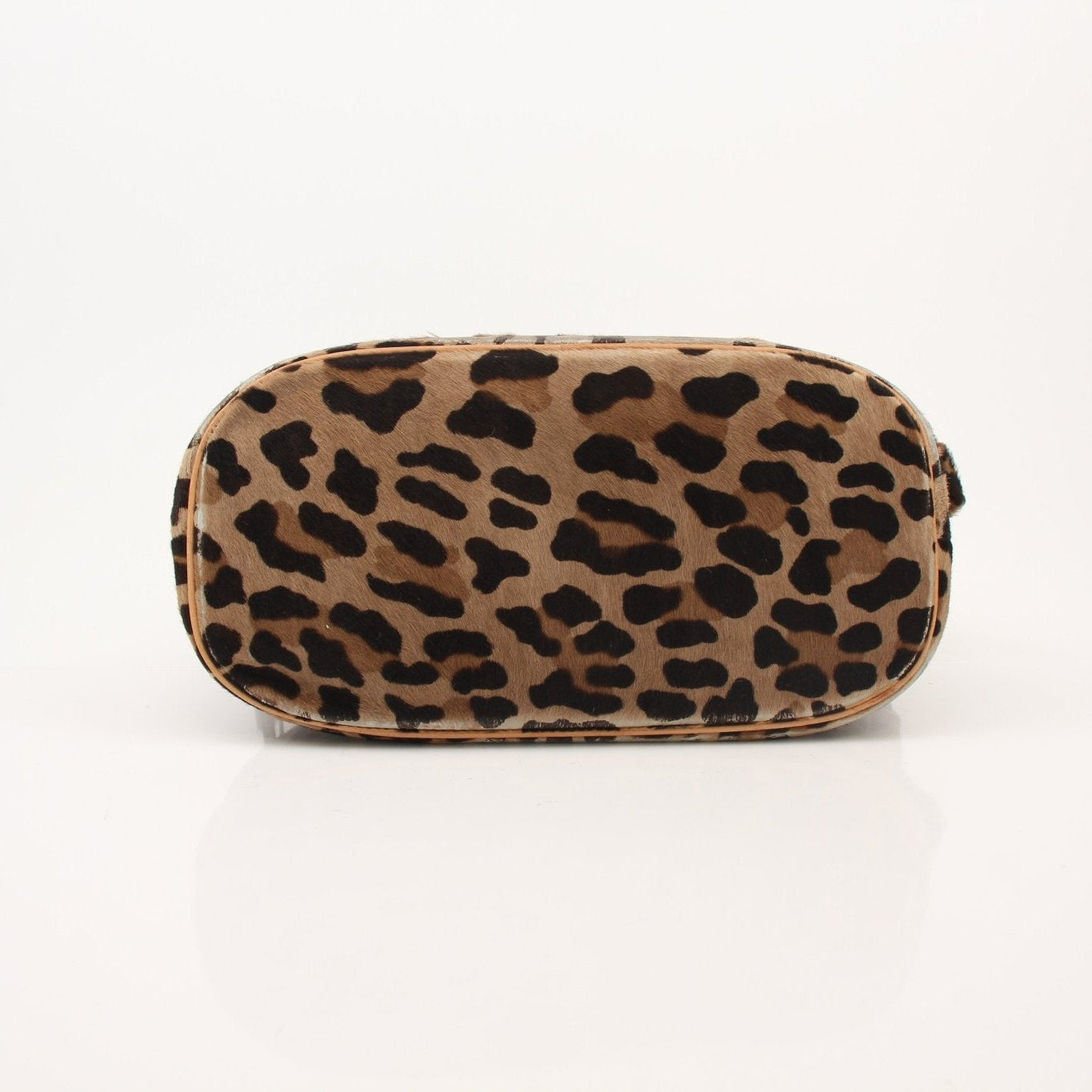 Louis Vuitton x ALAÏA limited edition vintage leopard bag featuring gold hardware and bold animal print design.