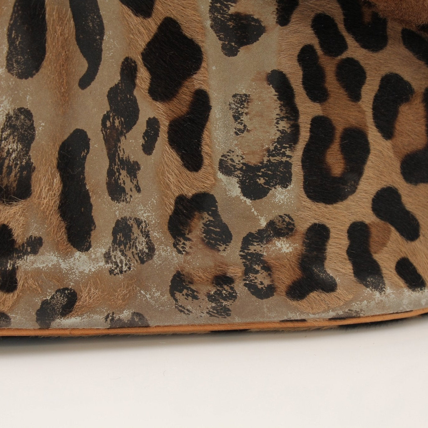 Gold & Beyond Louis Vuitton x ALAÏA handbag with gold hardware and designer monogram, stylish and luxurious accessory.