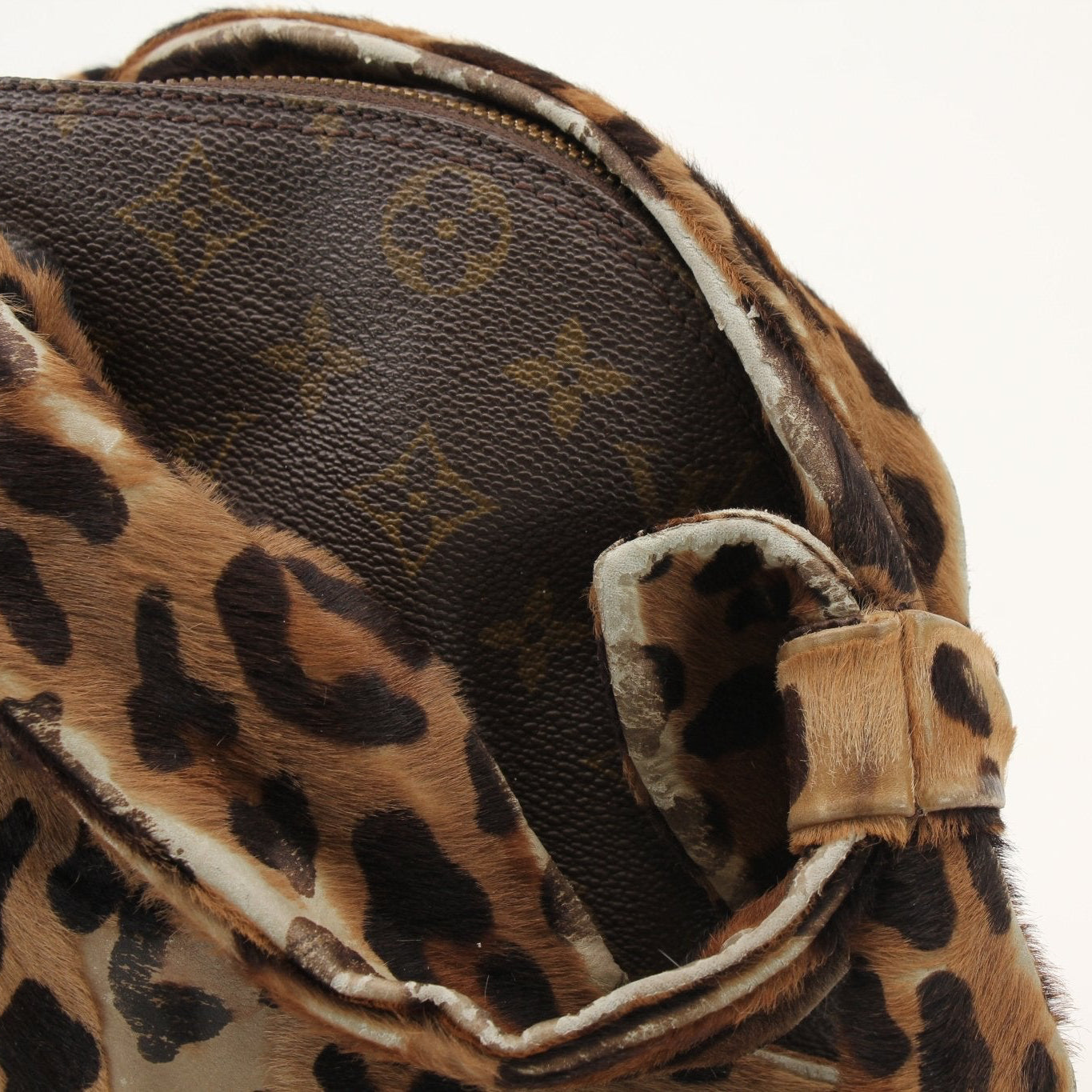 Louis Vuitton x ALAÏA handbag in gold and black with designer details, crafted by Gold & Beyond.